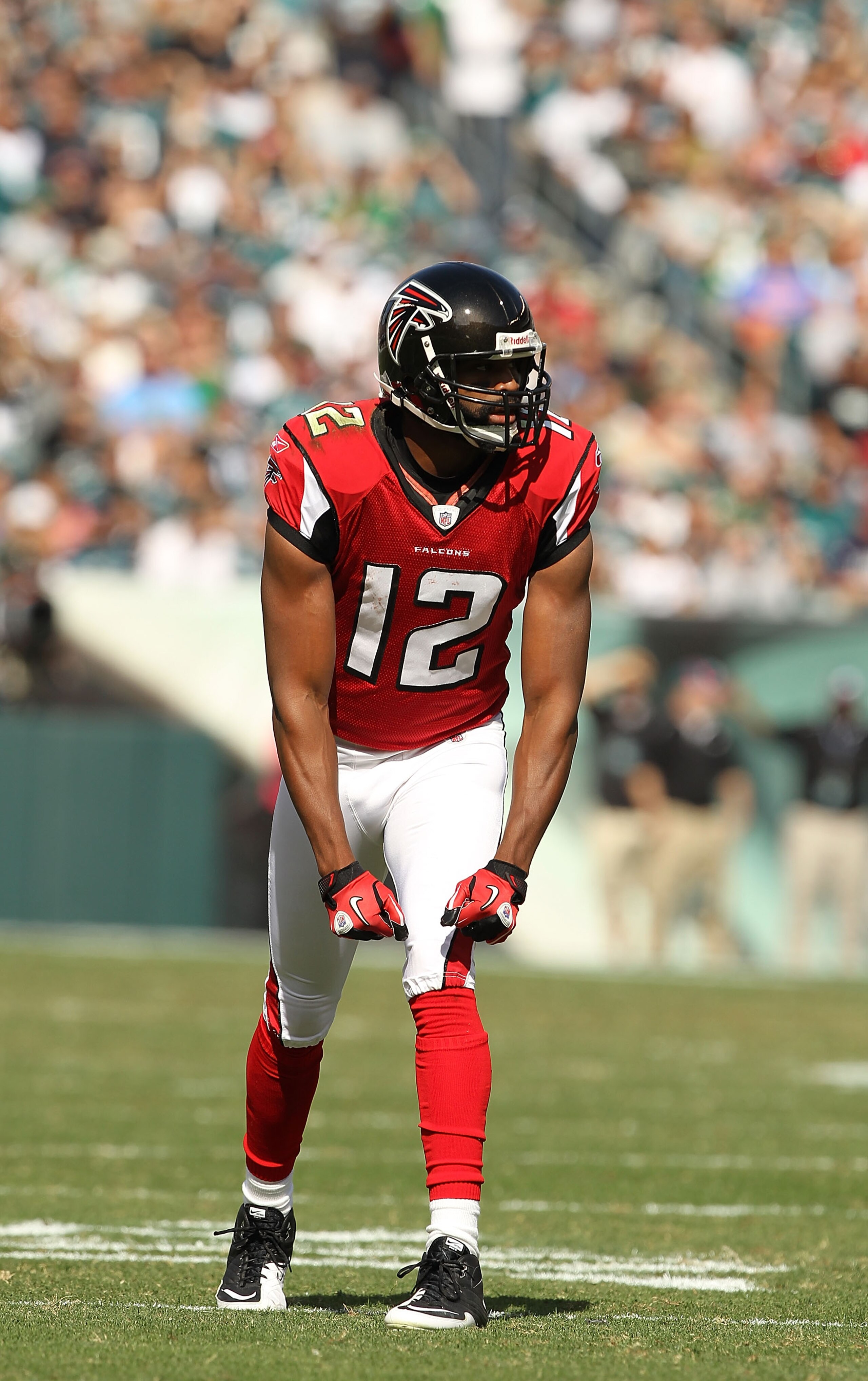 PHILADELPHIA - OCTOBER 17:  Michael Jenkins #12 of the Atlanta Falcons in action against  the Philadelphia Eagles during their game at Lincoln Financial Field on October 17, 2010 in Philadelphia, Pennsylvania.  (Photo by Al Bello/Getty Images)