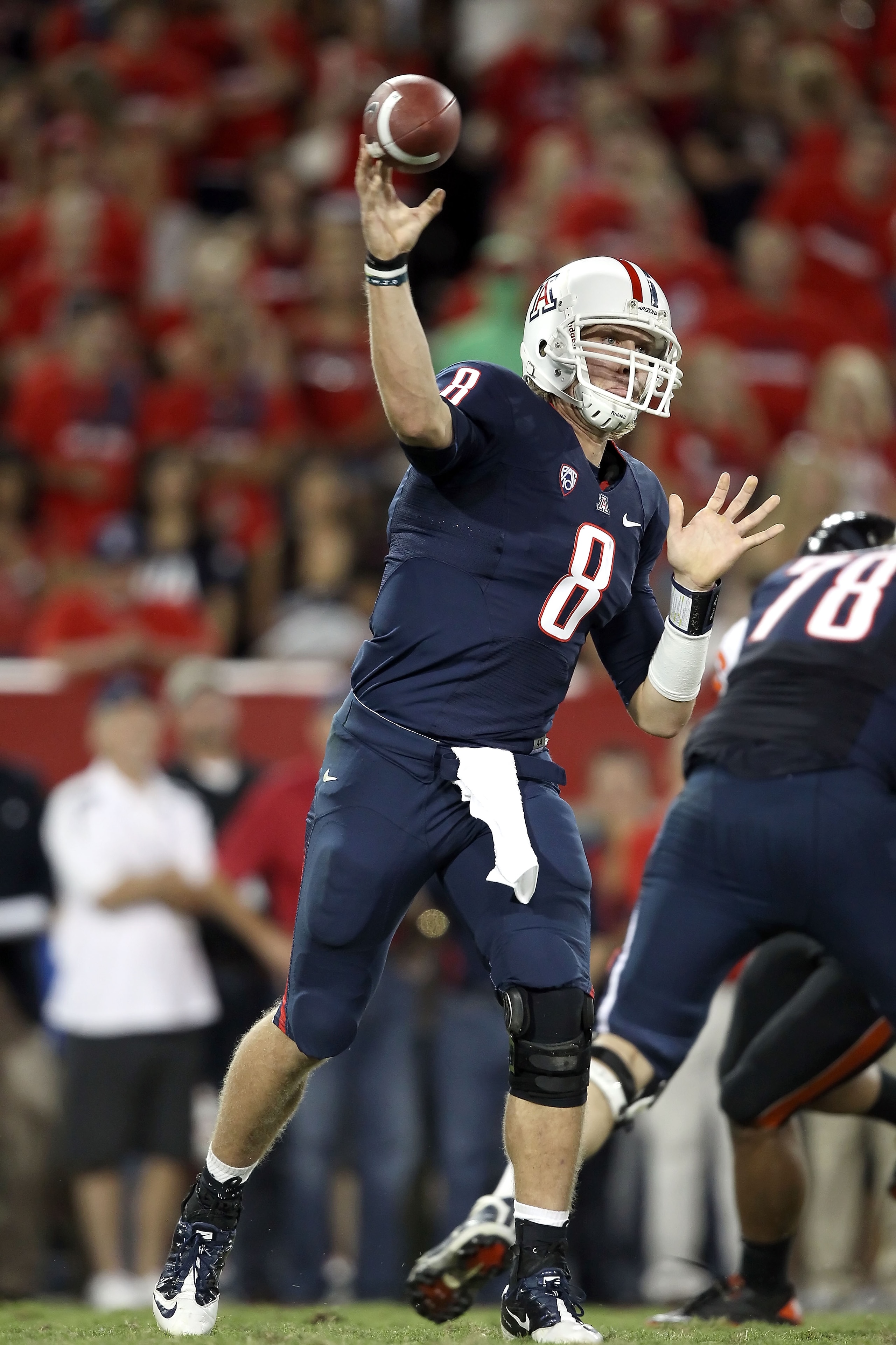 TUCSON, AZ - OCTOBER 09: Quarterback Nick Foles #8 of the Arizona Wildcats throws a pass during the college football game against the Oregon State Beavers at Arizona Stadium on October 9, 2010 in Tucson, Arizona. (Photo by Christian Petersen/Getty Image TUCSON, AZ - OCTOBER 09: Quarterback Nick Foles #8 of the Arizona Wildcats throws a pass during the college football game against the Oregon State Beavers at Arizona Stadium on October 9, 2010 in Tucson, Arizona. (Photo by Christian Petersen/Getty Image