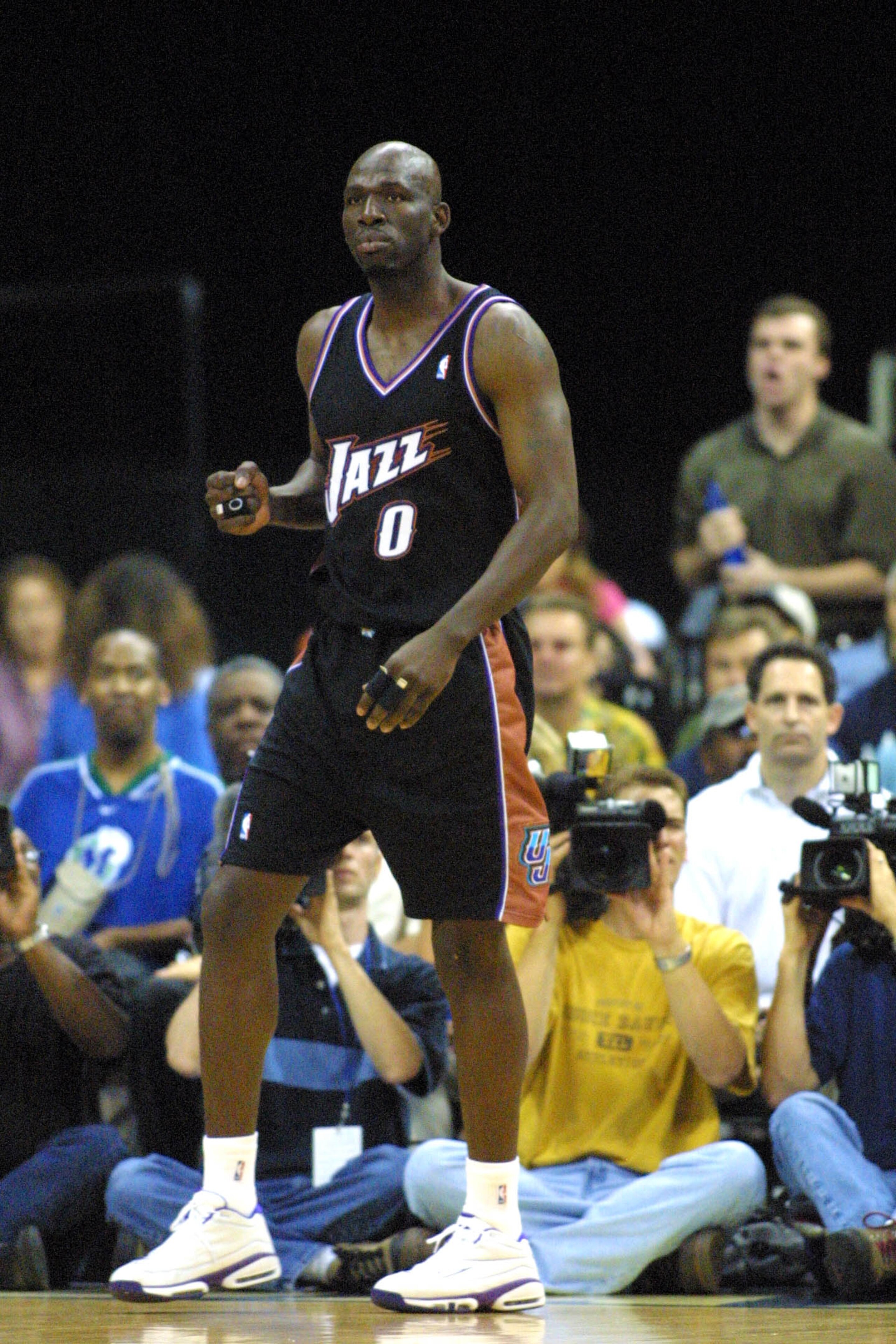 28 Apr 2001:  Olden Polynice #0 of the Utah Jazz in game three of round one in the NBA playoffs against the Dallas Mavericks at Reunion Arena in Dallas, Texas.  The Mavericks won 94-91. DIGITAL IMAGE.  Mandatory Credit:  Ronald Martinez/Allsport