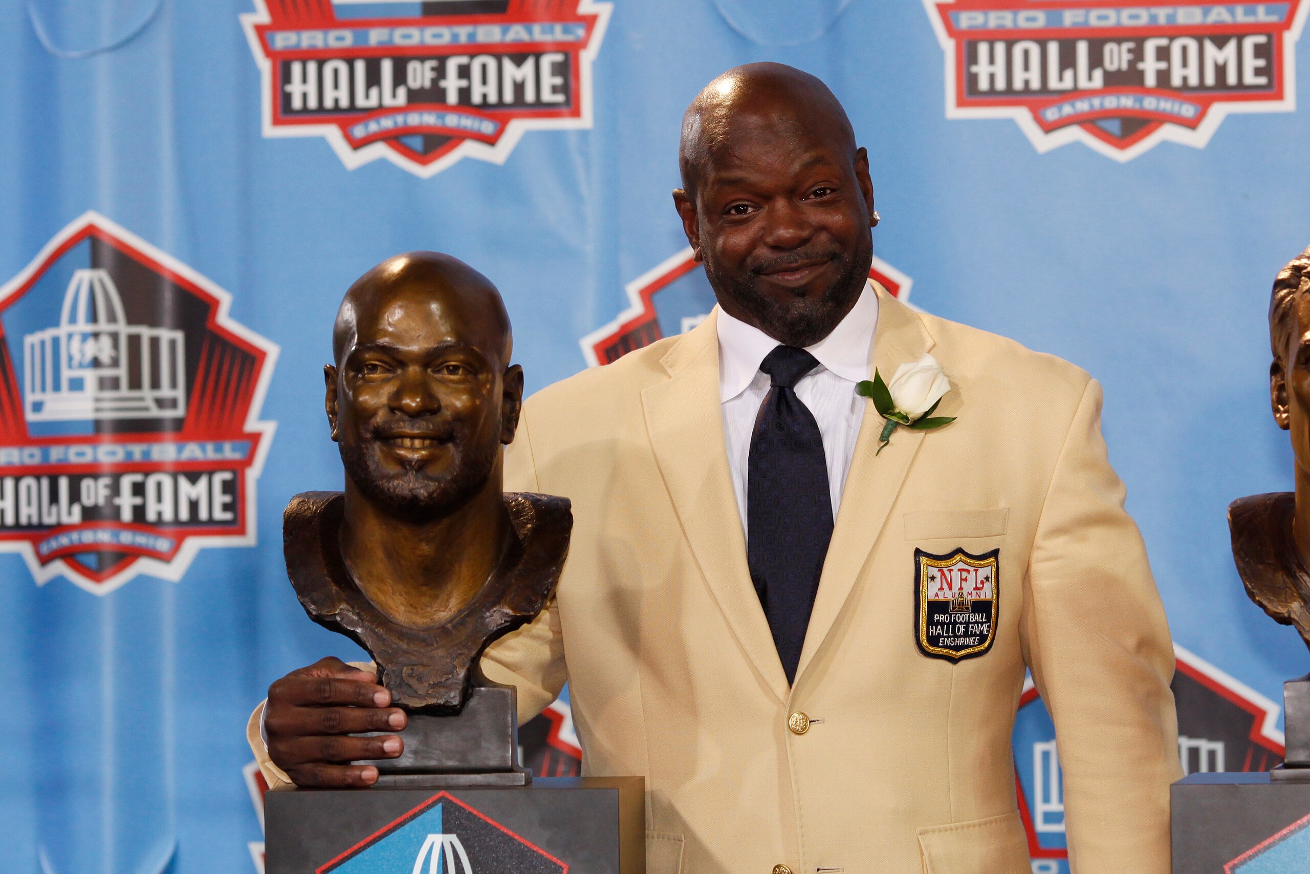 CANTON, OH - AUGUST 7: Emmitt Smith poses with his bust during the 2010 Pro Football Hall of Fame Enshrinement Ceremony at the Pro Football Hall of Fame Field at Fawcett Stadium on August 7, 2010 in Canton, Ohio. (Photo by Joe Robbins/Getty Images)