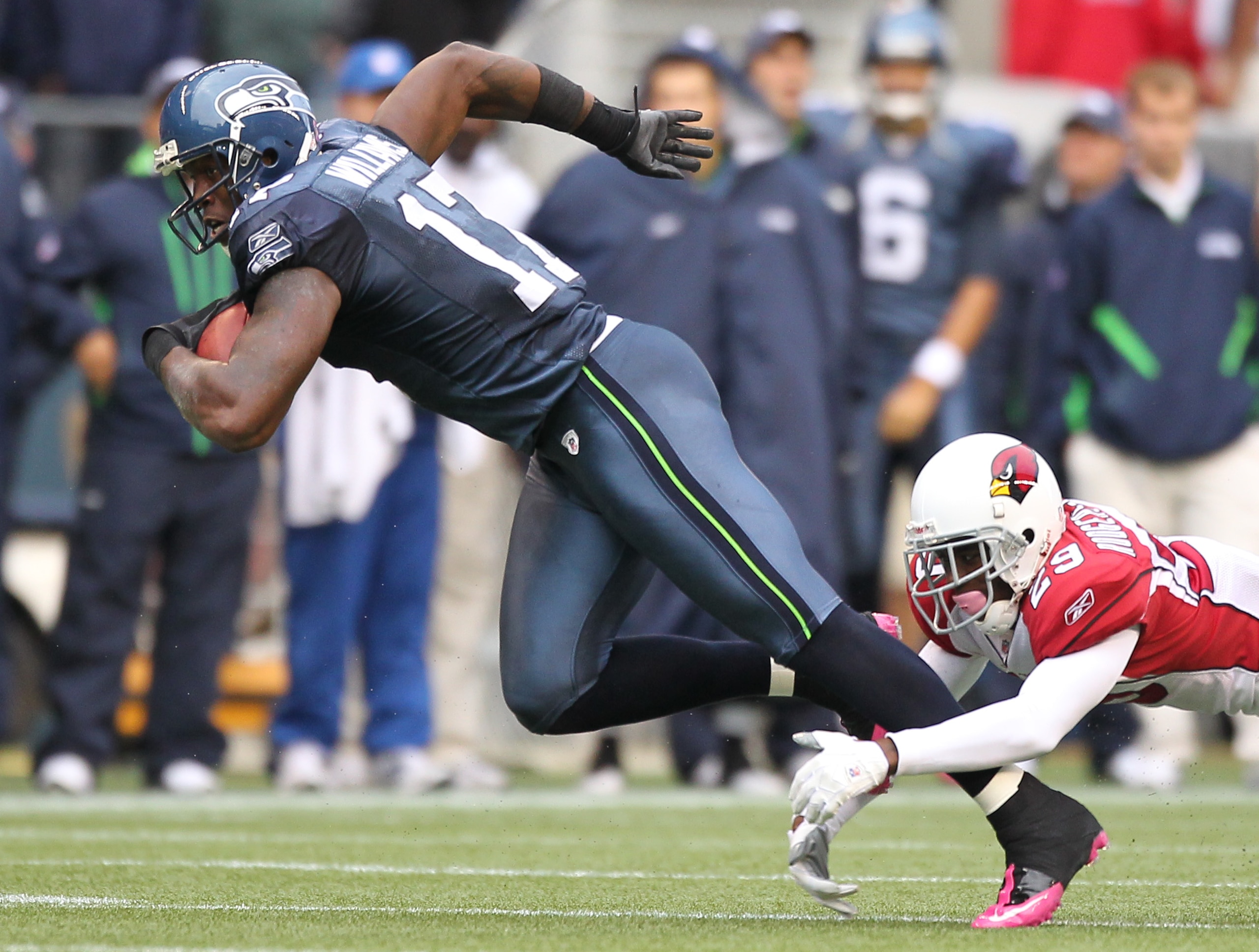 SEATTLE - OCTOBER 24:  Wide receiver Mike Williams #17 of the Seattle Seahawks rushes against Dominique Rodgers-Cromartie #29 of the Arizona Cardinals at Qwest Field on October 24, 2010 in Seattle, Washington. (Photo by Otto Greule Jr/Getty Images)