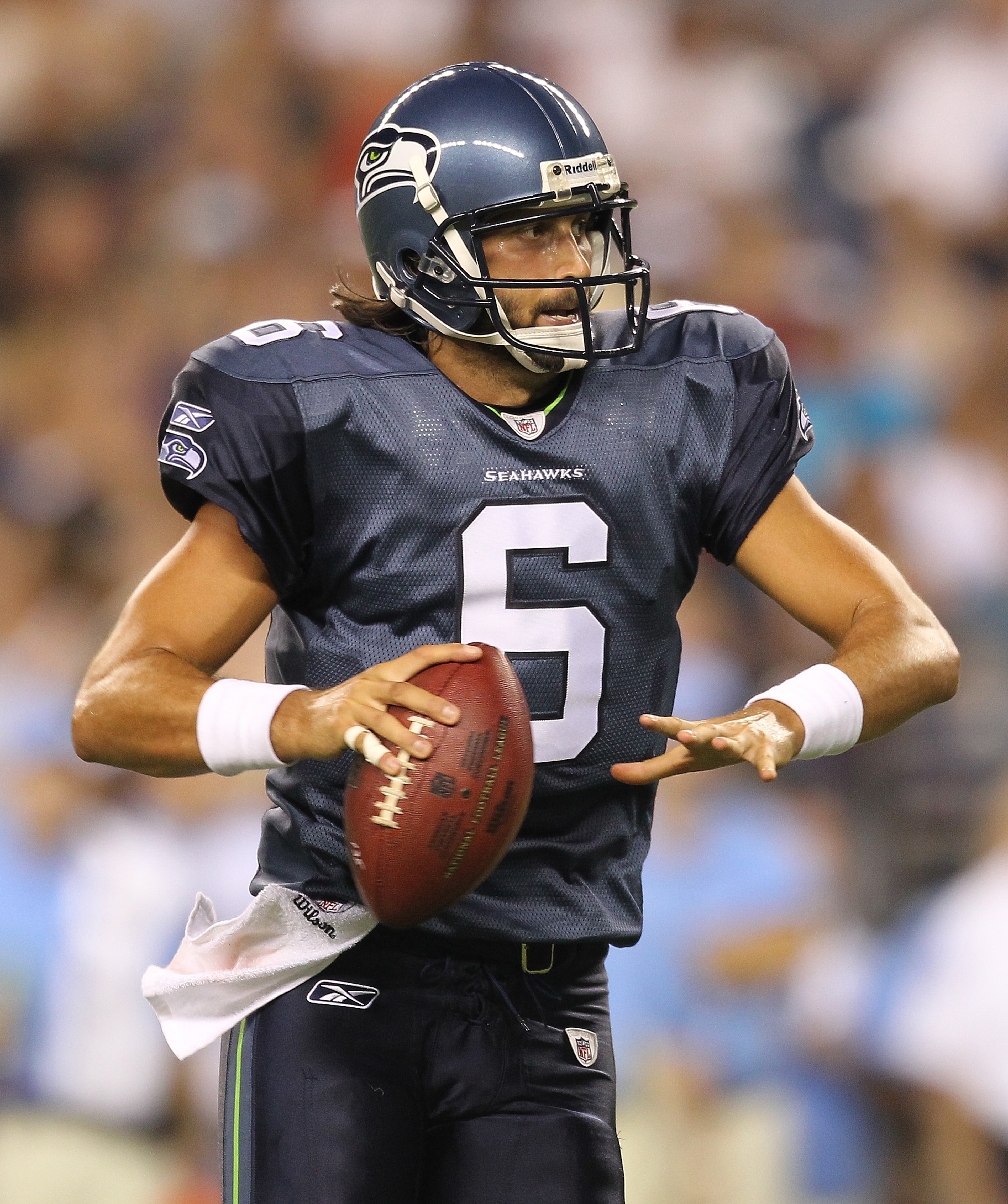 SEATTLE - AUGUST 14:  Quarterback Charlie Whitehurst #6 of the Seattle Seahawks looks to pass during the preseason game against the Tennessee Titans at Qwest Field on August 14, 2010 in Seattle, Washington. The Seahawks defeated the Titans 20-18. (Photo b
