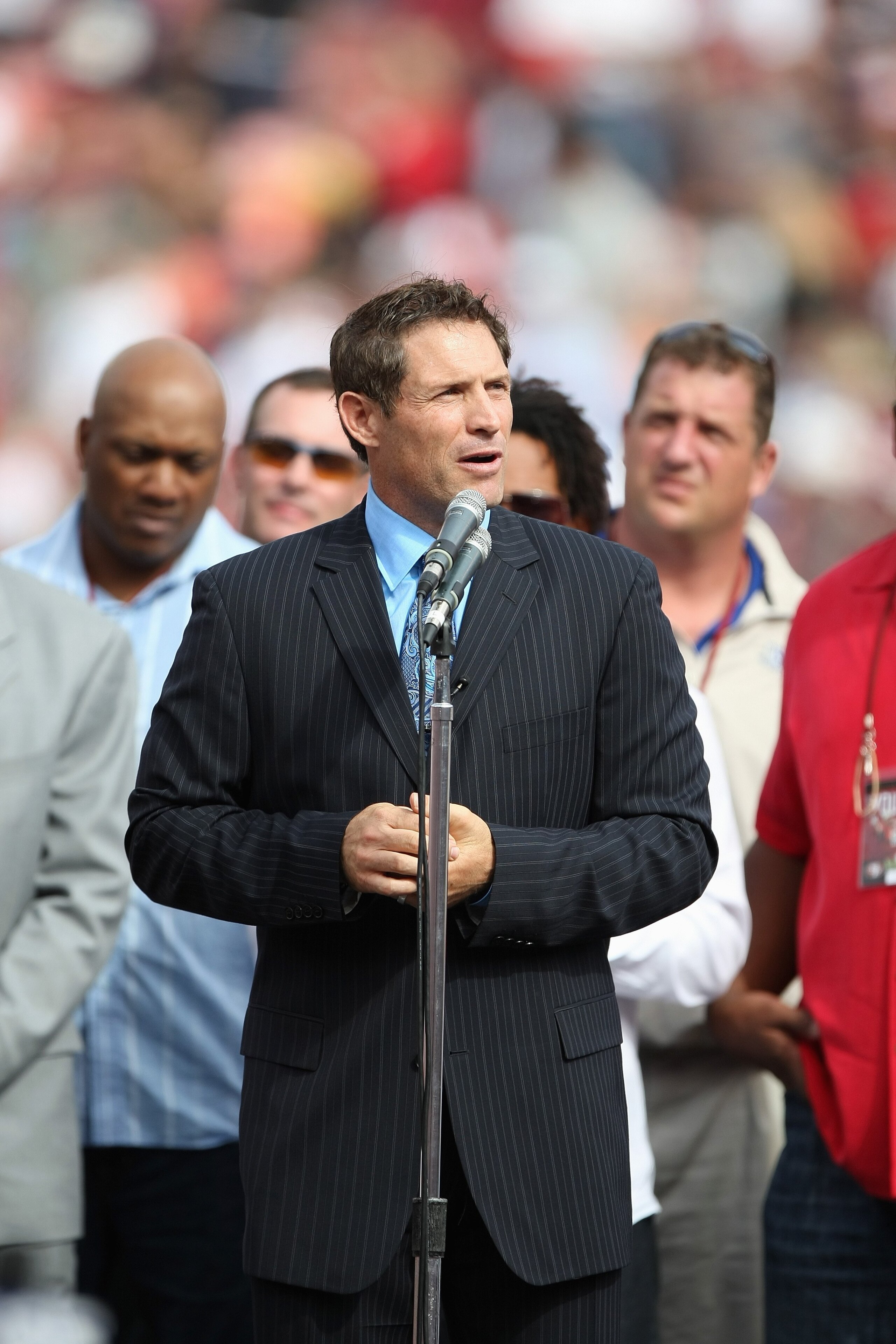 SAN FRANCISCO - OCTOBER 5: Former San Francisco 49ers quarterback Steve Young speaks during a ceremony to retire his number at halftime of the New England Patriots and the San Francisco 49ers NFL game on October 5, 2008 at Candlestick Park in San Francisc