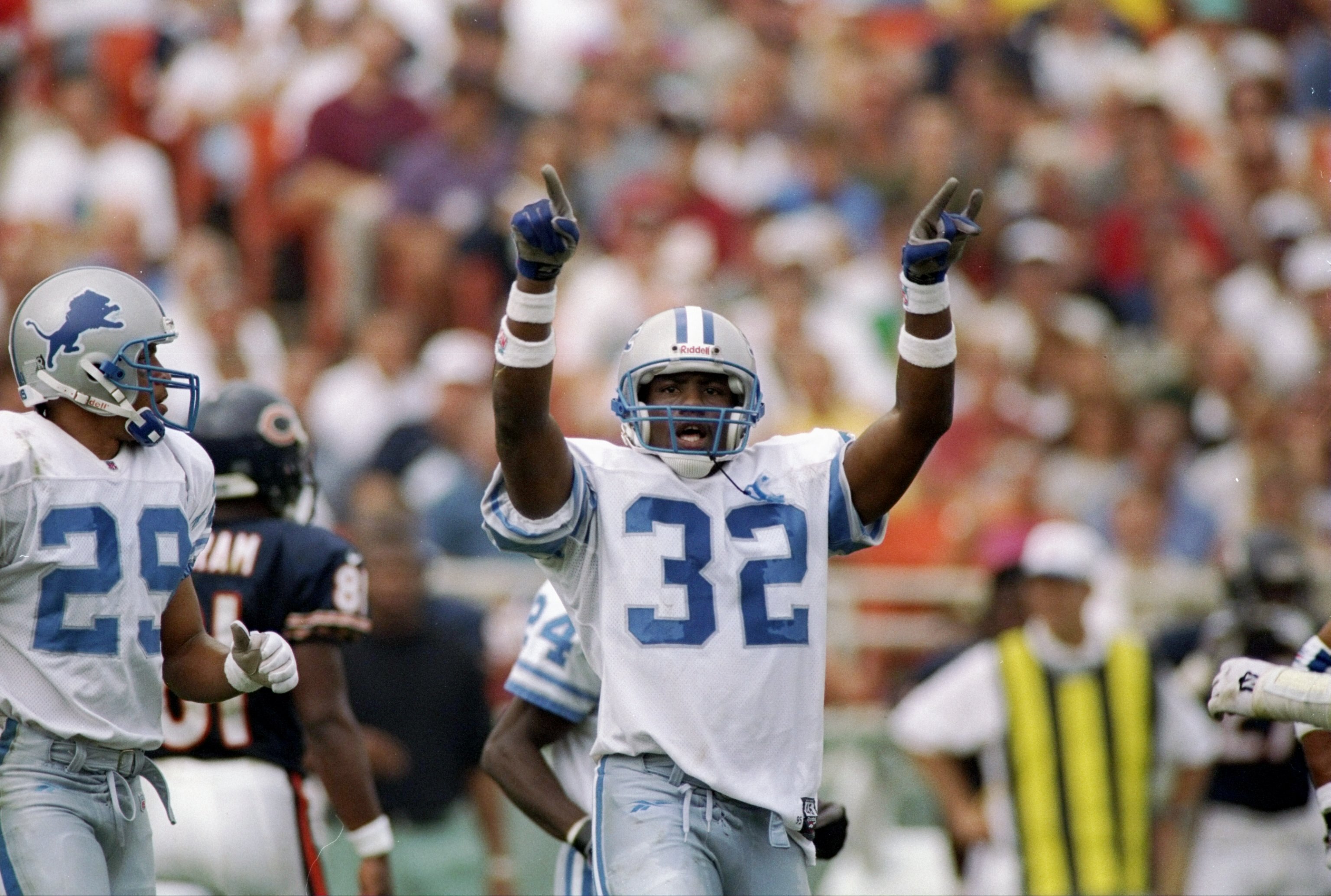 14 Sep 1997:  Bryant Westbrook #32 and Harry Colon #29  of the Detroit Lions in action during a game against the Chicago Bears at Soldier Field in Chicago, Illinois.  The Lions won the game 32-7.    Mandatory Credit: Matthew Stockman  /Allsport