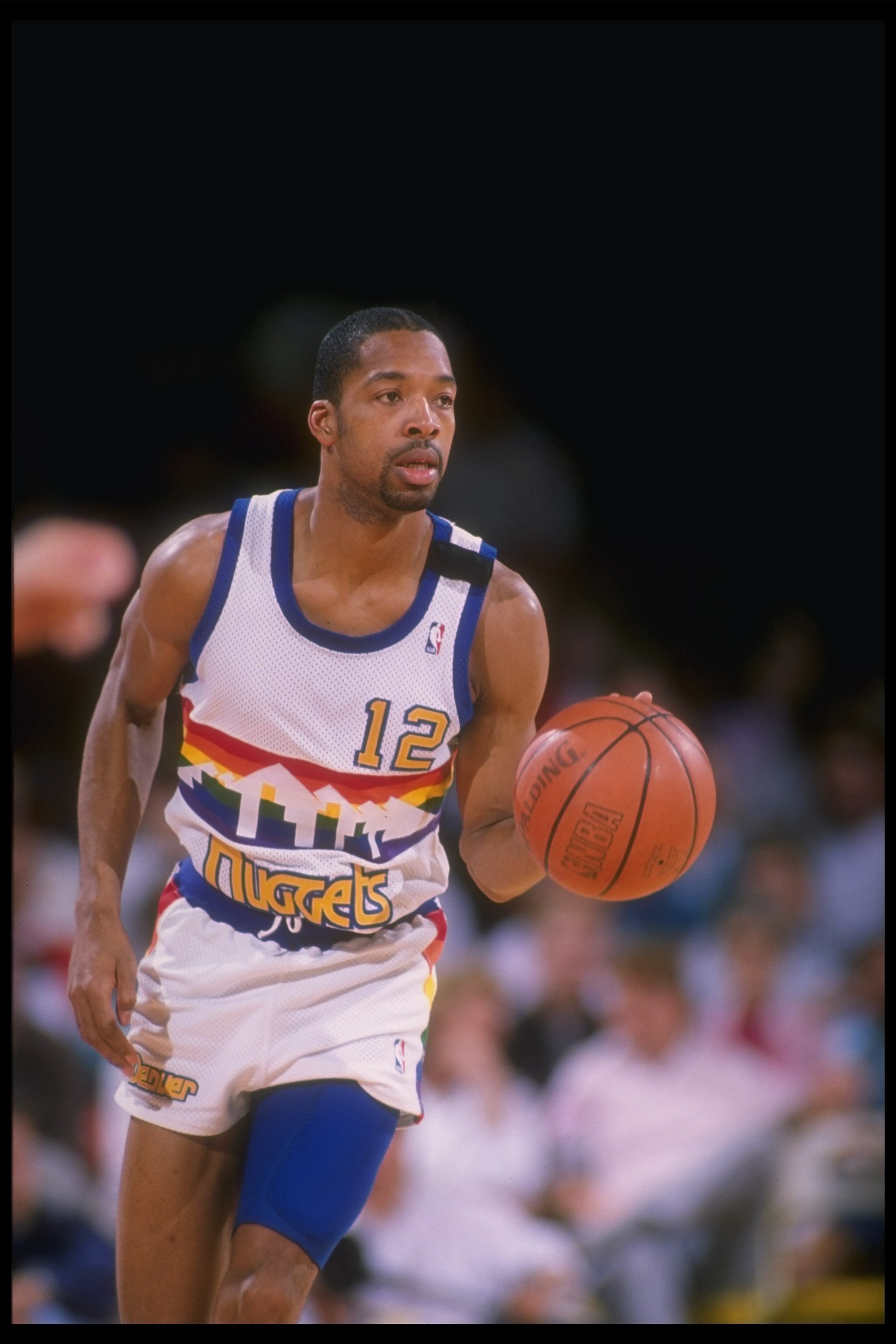 1989-1990:  Guard Fat Lever of the Denver Nuggets moves the ball during a game at the McNichols Sports Arena in Denver, Colorado. Mandatory Credit: Tim DeFrisco  /Allsport Mandatory Credit: Tim DeFrisco  /Allsport