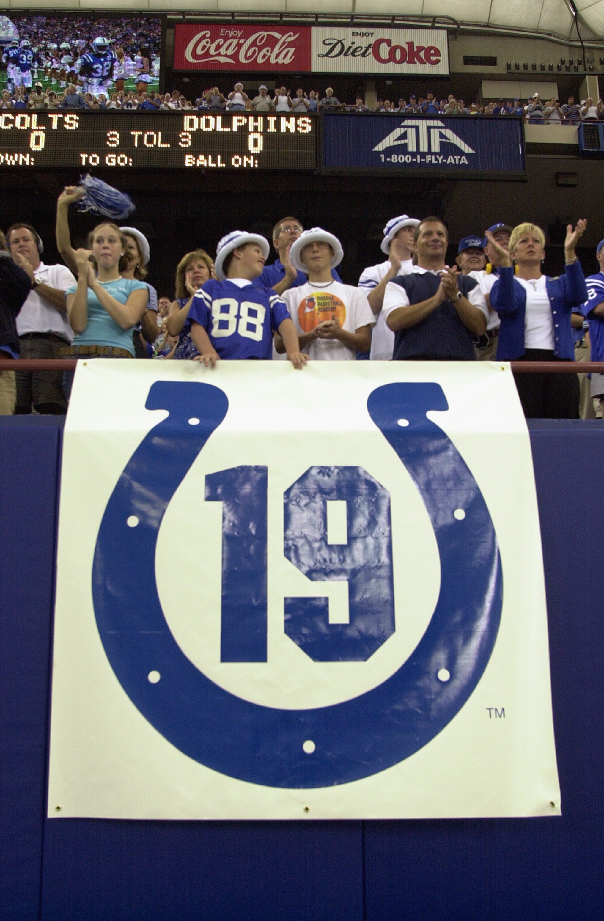 INDIANAPOLIS - SEPTEMBER 15:  Fans cheer above a banner in memory of former Baltimore Colts quarterback Johnny Unitas who passed away this past week before the Indianapolis Colts take on the Miami Dolphins on September 15, 2002 at the RCA Dome in Indianap