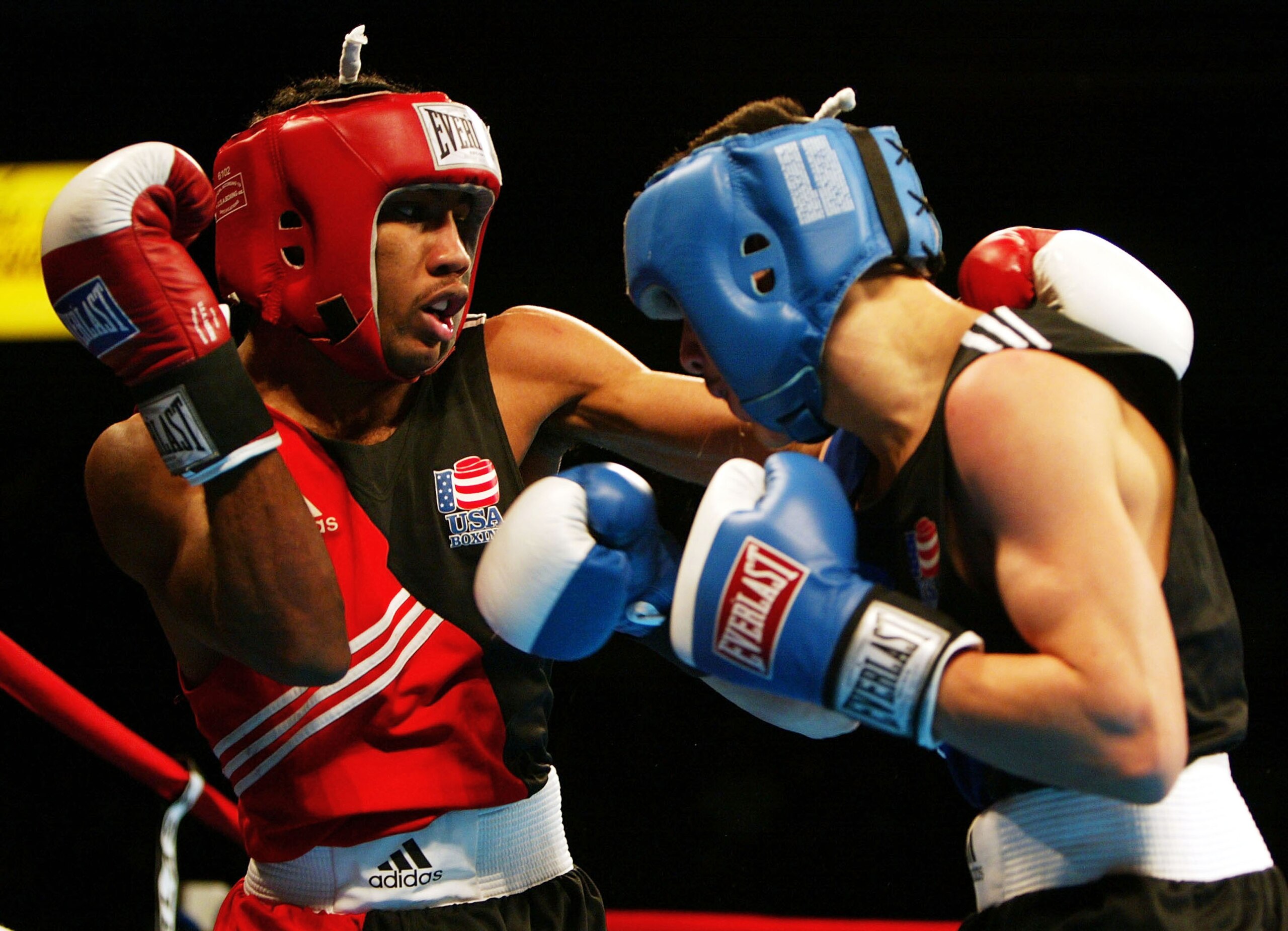 CLEVELAND, OH - FEBRUARY 27: Mickey Bey Jr. of Cleveland, Ohio (L) lands a punch during his featherweight (125lbs) match against Brandon Rios of Garden City, Kansas during the 2004 Olympic Box-Offs at the Cleveland Convocation Center February 27, 2004 in CLEVELAND, OH - FEBRUARY 27: Mickey Bey Jr. of Cleveland, Ohio (L) lands a punch during his featherweight (125lbs) match against Brandon Rios of Garden City, Kansas during the 2004 Olympic Box-Offs at the Cleveland Convocation Center February 27, 2004 in