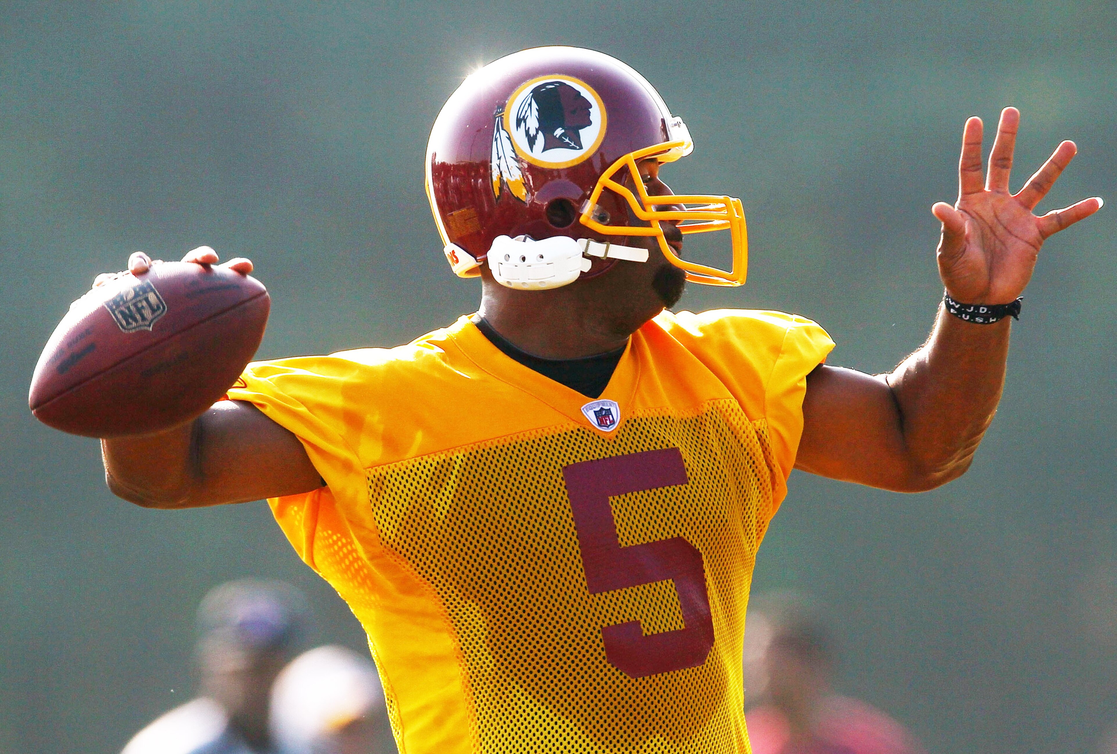 ASHBURN, VA - AUGUST 06:  Quarterback Donovan McNabb #5 of the Washington Redskins takes part in drills during Redskins training camp on August 6, 2010 in Ashburn, Virginia.  (Photo by Win McNamee/Getty Images)