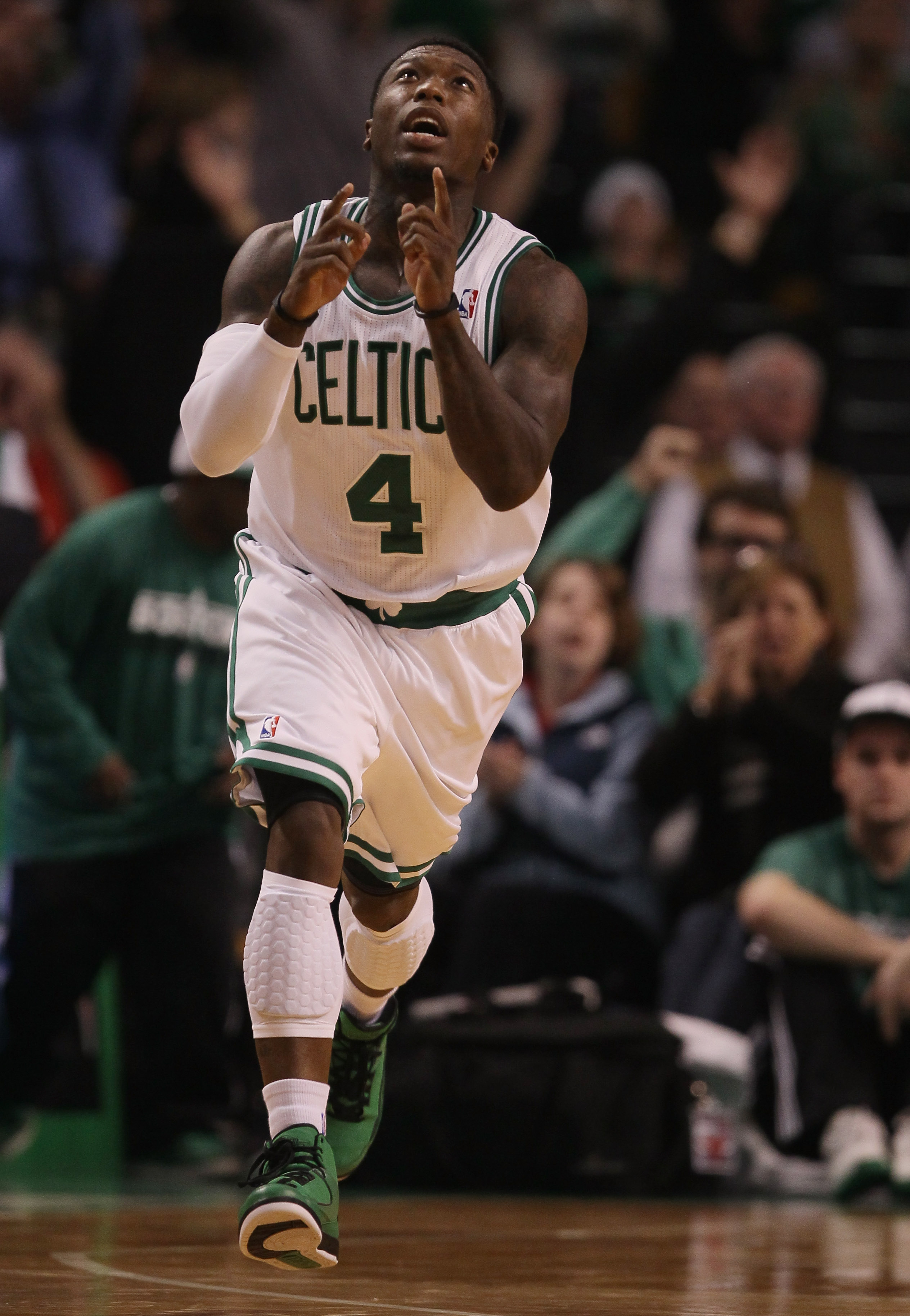 BOSTON - NOVEMBER 05:  Nate Robinson #4 of the Boston Celtics celebrates his three pointer in the second half against the Chicago Bulls on November 5, 2010 at the TD Garden in Boston, Massachusetts. The Celtics defeated the Bulls 110-105 in overtime. NOTE