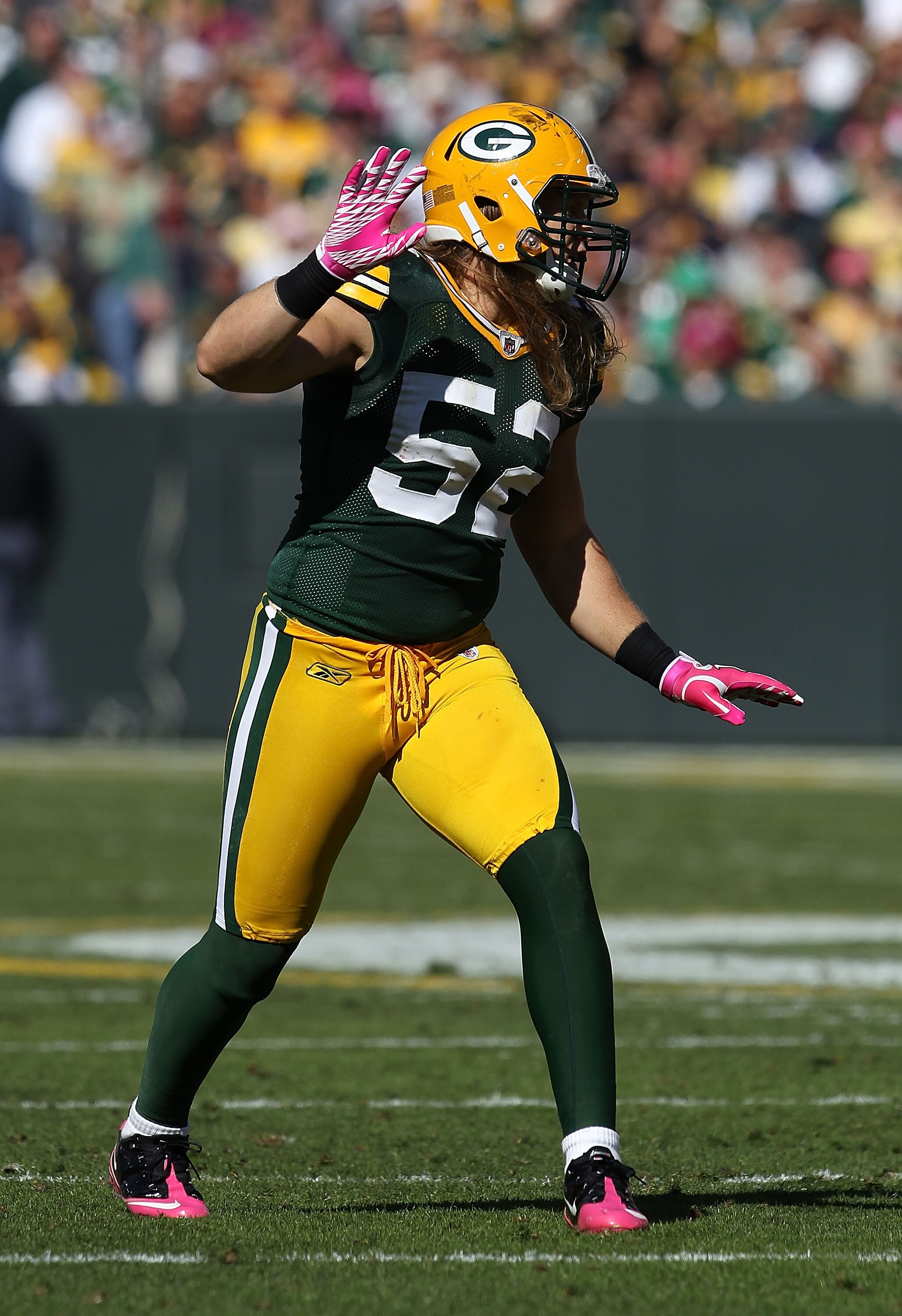 GREEN BAY, WI - OCTOBER 03: Clay Matthews #52 of the Green Bay Packers awaits the start of play against the Detroit Lions at Lambeau Field on October 3, 2010 in Green Bay, Wisconsin. The Packers defeated the Lions 28-26. (Photo by Jonathan Daniel/Getty Im