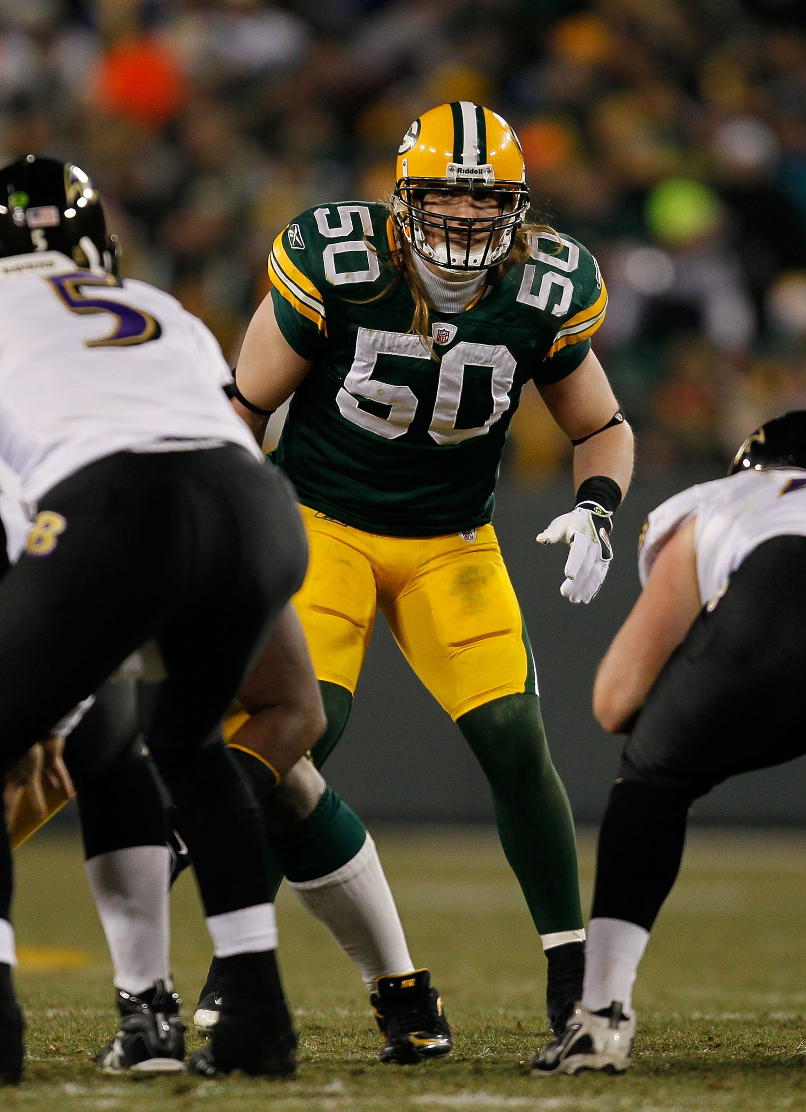 GREEN BAY, WI - DECEMBER 07: A.J. Hawk #50 of the Green Bay Packers awaits the start of play against the Baltimore Ravens at Lambeau Field on December 7, 2009 in Green Bay, Wisconsin. The Packers defeated the Ravens 27-17. (Photo by Jonathan Daniel/Getty
