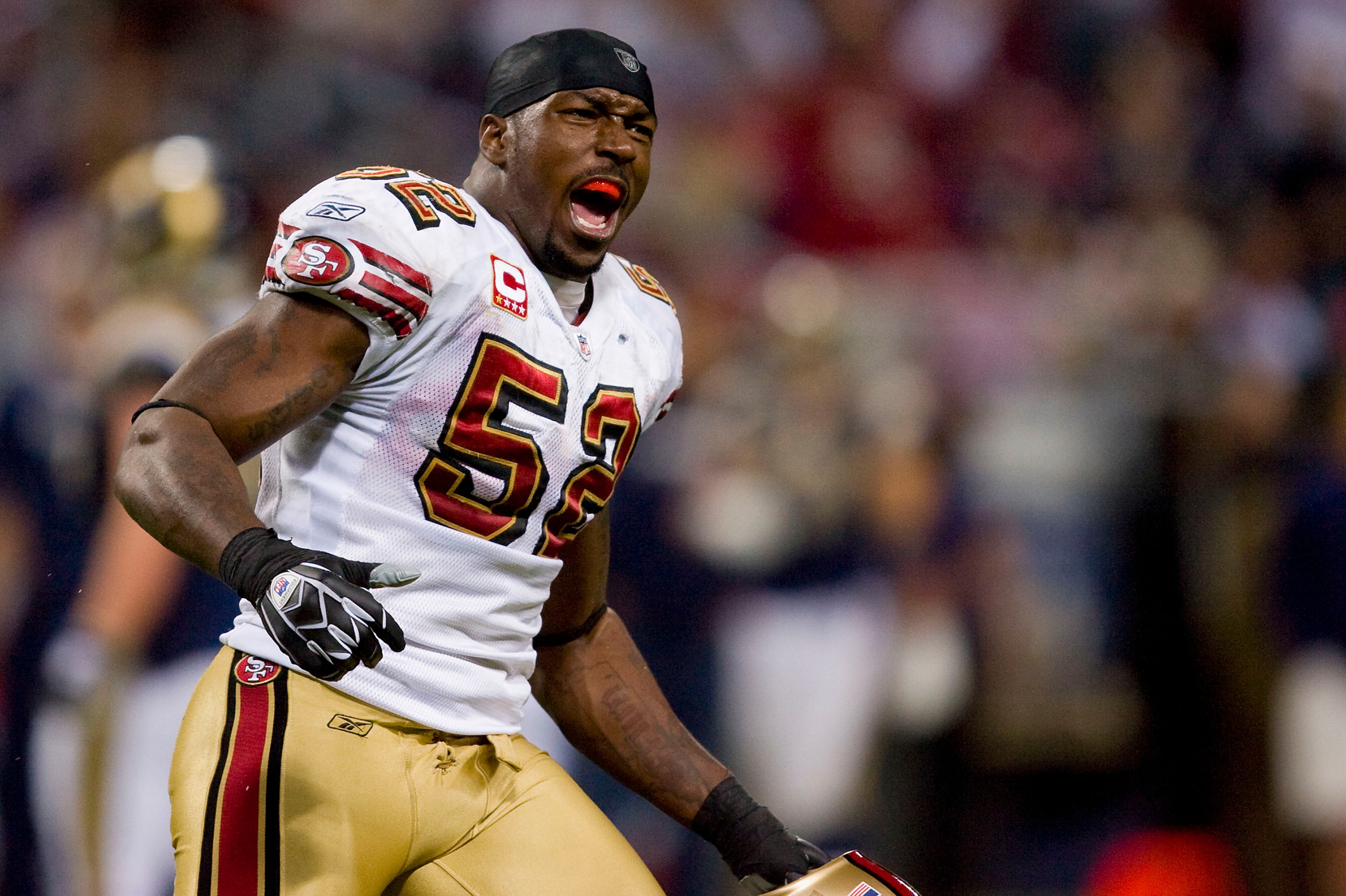 ST. LOUIS, MO - DECEMBER 21: Patrick Willis #52 of the San Francisco 49ers celebrates a victory against the St. Louis Rams at the Edward Jones Dome on December 21, 2008 in St. Louis, Missouri.  The 49ers beat the Rams 17-16.  (Photo by Dilip Vishwanat/Get
