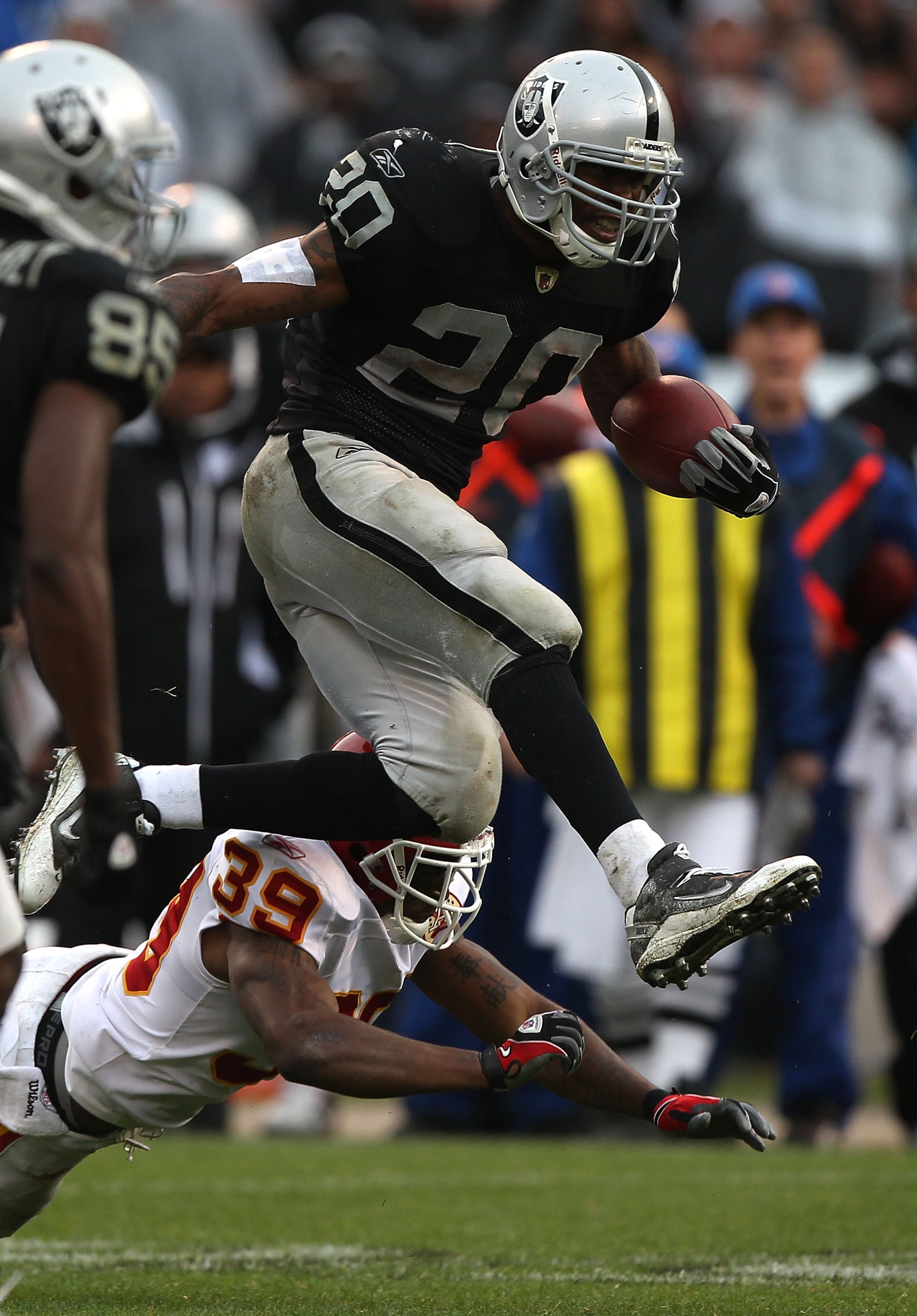 OAKLAND, CA - NOVEMBER 07: Darren McFadden #20 of the Oakland Raiders runs against Brandon Carr #39 of the Kansas City Chiefs during an NFL game at Oakland-Alameda County Coliseum on November 7, 2010 in Oakland, California. (Photo by Jed Jacobsohn/Getty OAKLAND, CA - NOVEMBER 07: Darren McFadden #20 of the Oakland Raiders runs against Brandon Carr #39 of the Kansas City Chiefs during an NFL game at Oakland-Alameda County Coliseum on November 7, 2010 in Oakland, California. (Photo by Jed Jacobsohn/Getty