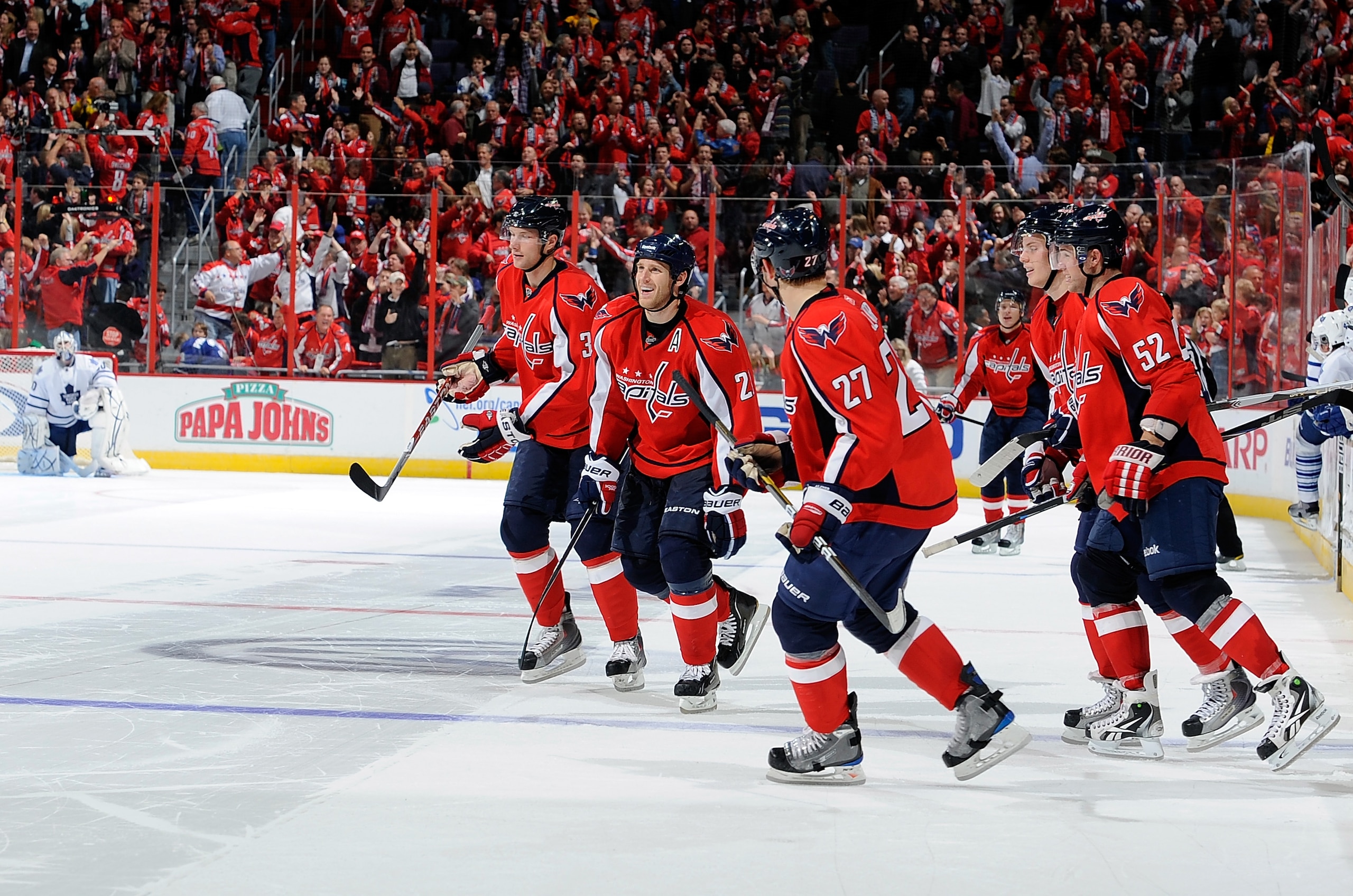 WASHINGTON - NOVEMBER 03:  The Washington Capitals celebrate after a 5-4 shootout victory against the Toronto Maple Leafs at the Verizon Center on November 3, 2010 in Washington, DC.  (Photo by Greg Fiume/Getty Images)