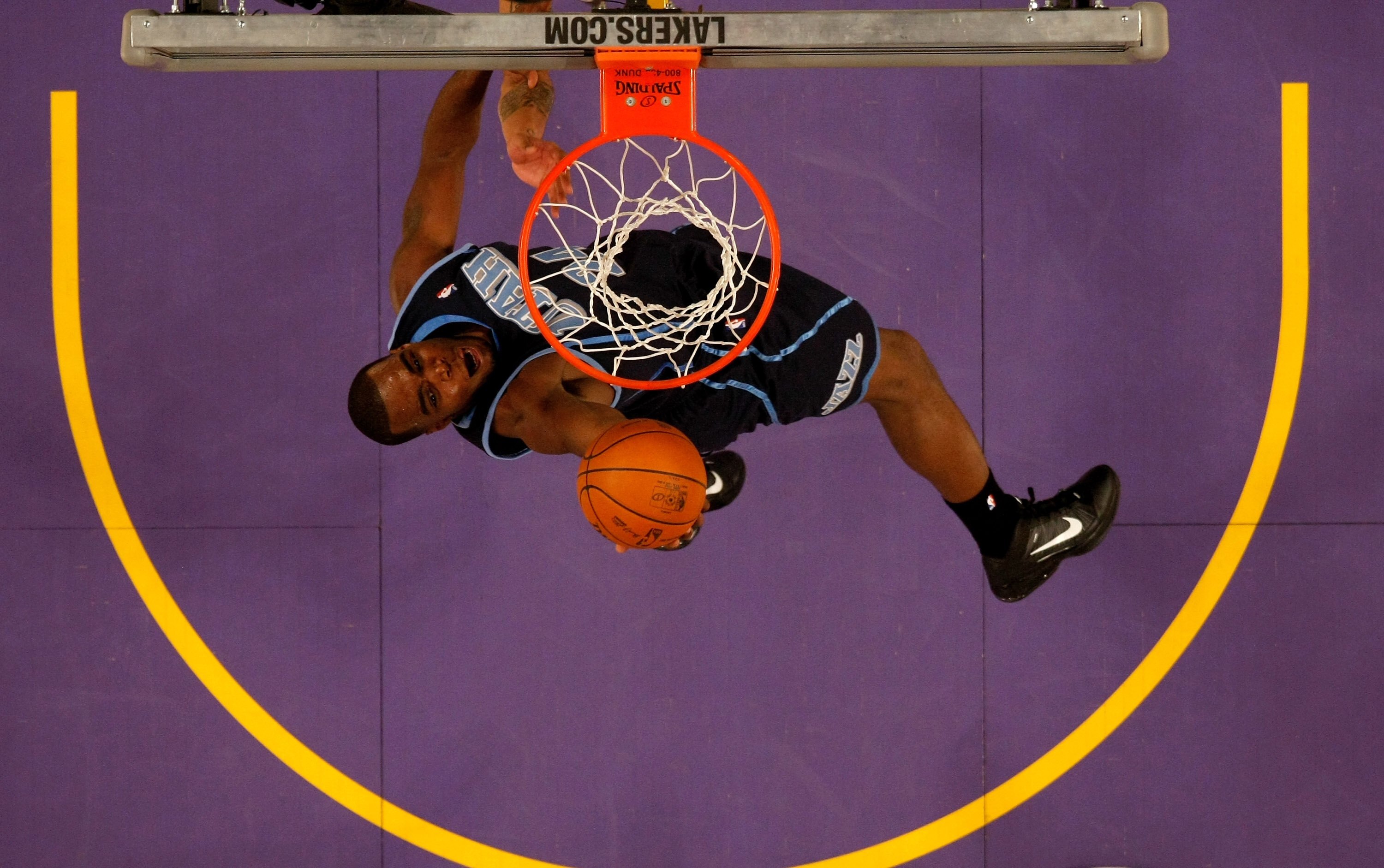 LOS ANGELES, CA - MAY 02:  Paul Millsap #24 of the Utah Jazz dunks against the Los Angeles Lakers during Game One of the Western Conference Semifinals of the 2010 NBA Playoffs on May 2, 2010 at Staples Center in Los Angeles, California.  The Lakers won 10