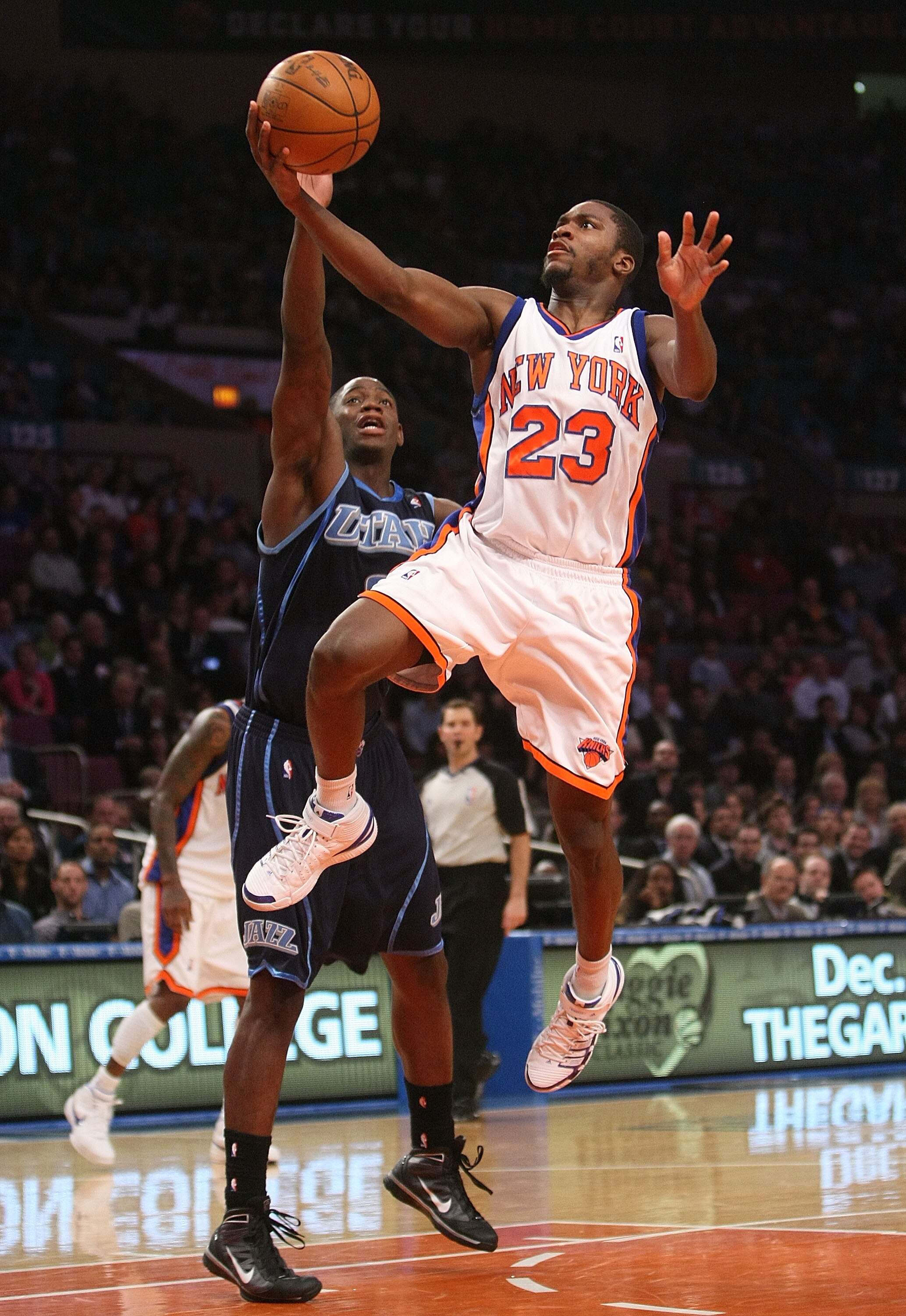 NEW YORK - NOVEMBER 09:  Toney Douglas #23 of the New York Knicks lays the ball up against the Utah Jazz at Madison Square Garden on November 9, 2009 in New York City. NOTE TO USER: User expressly acknowledges and agrees that, by downloading and or using