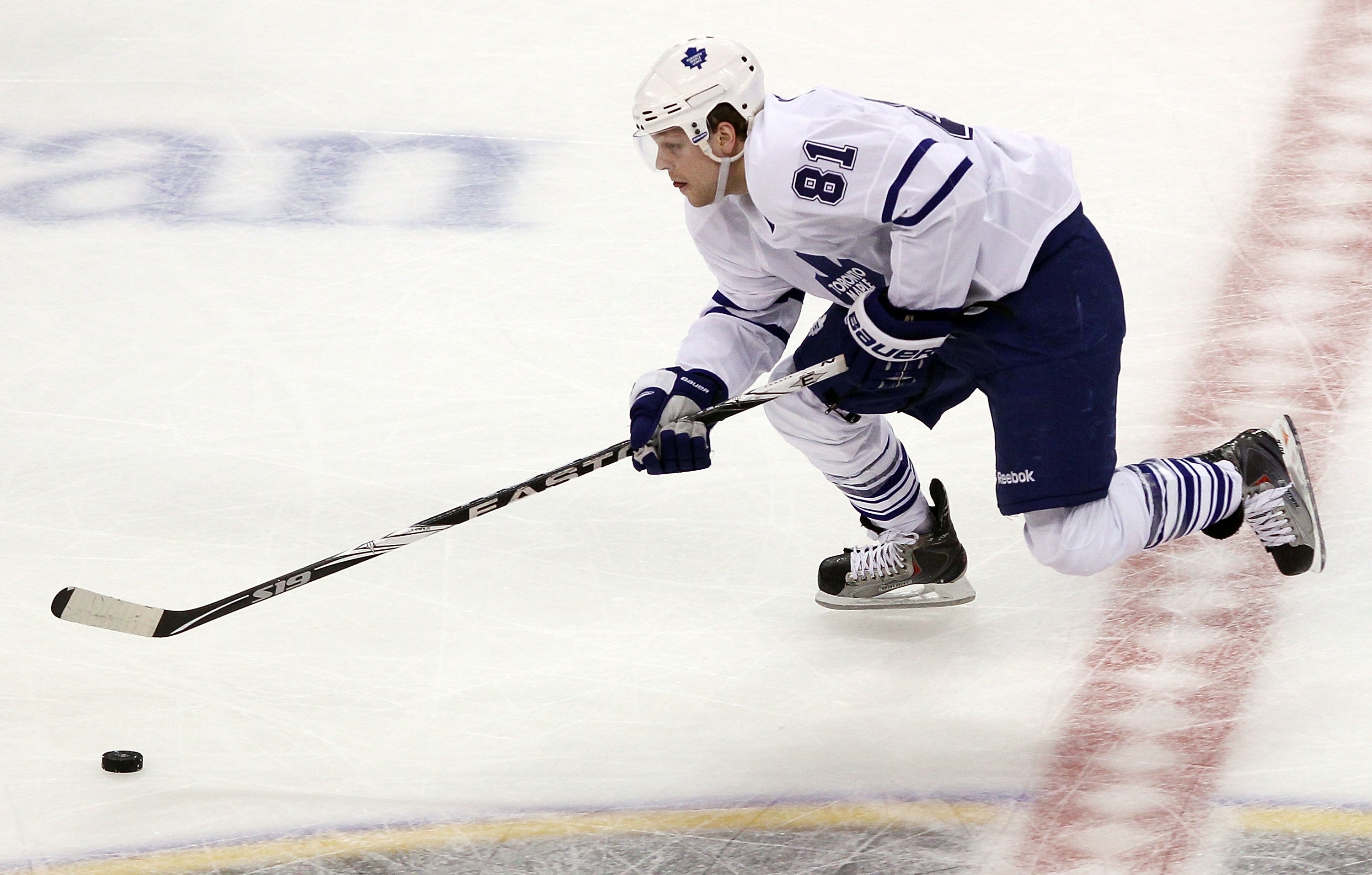 BOSTON - MARCH 04:  Phil Kessel #81 of the Toronto Maple Leafs takes the puck against the Boston Bruins on March 4, 2010 at the TD Garden in Boston, Massachusetts. The Bruins defeated the Maple Leafs 3-2 in an overtime shootout.  (Photo by Elsa/Getty Imag