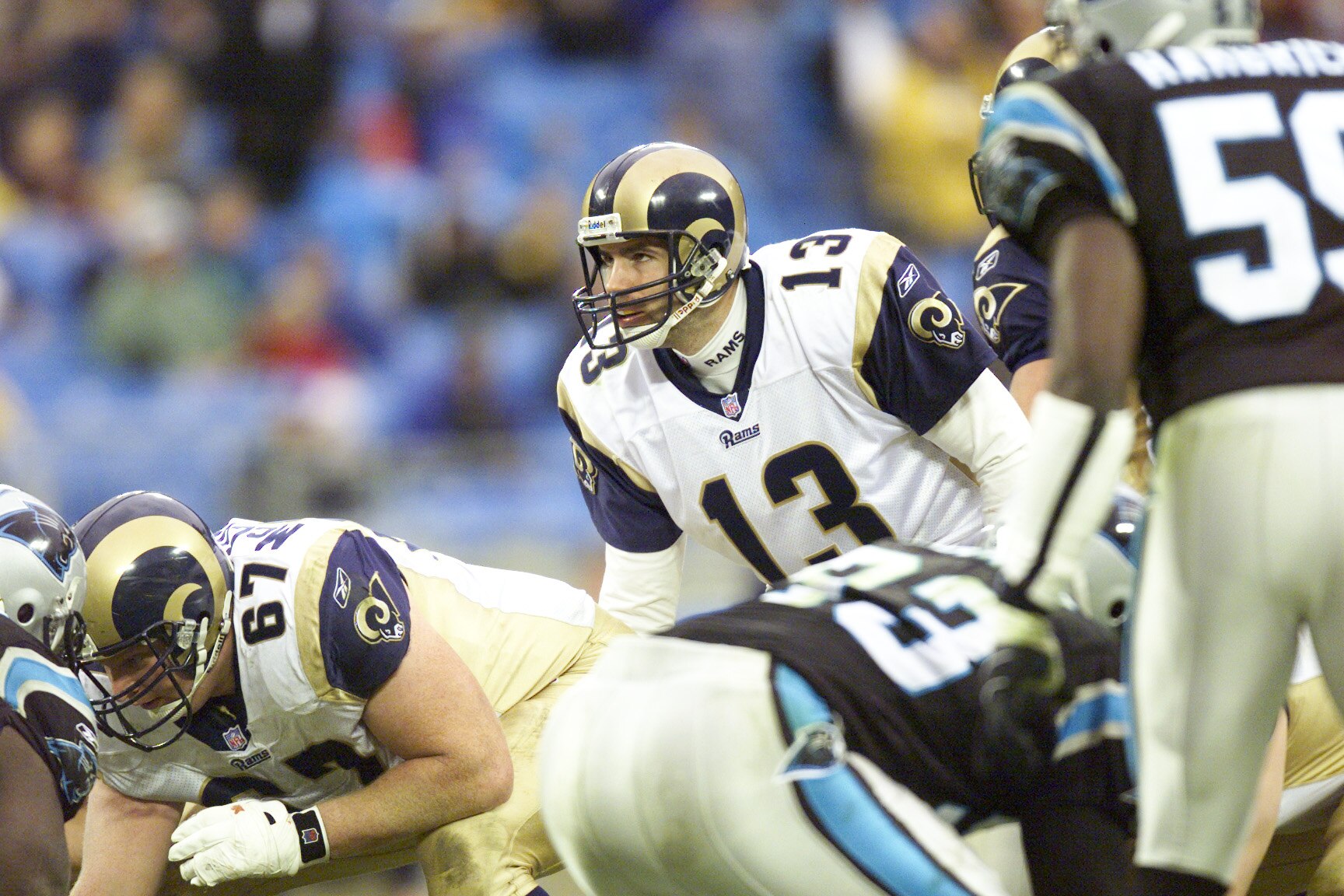 23 Dec 2001 : Quarterback Kurt Warner #13 of the St.Louis Rams signals during the game against the Carolina Panthers at Ericsson Stadium in Charlotte, North Carolina. The Rams won 38-32. DIGITAL IMAGE. Mandatory Credit: Craig Jones/Getty Images