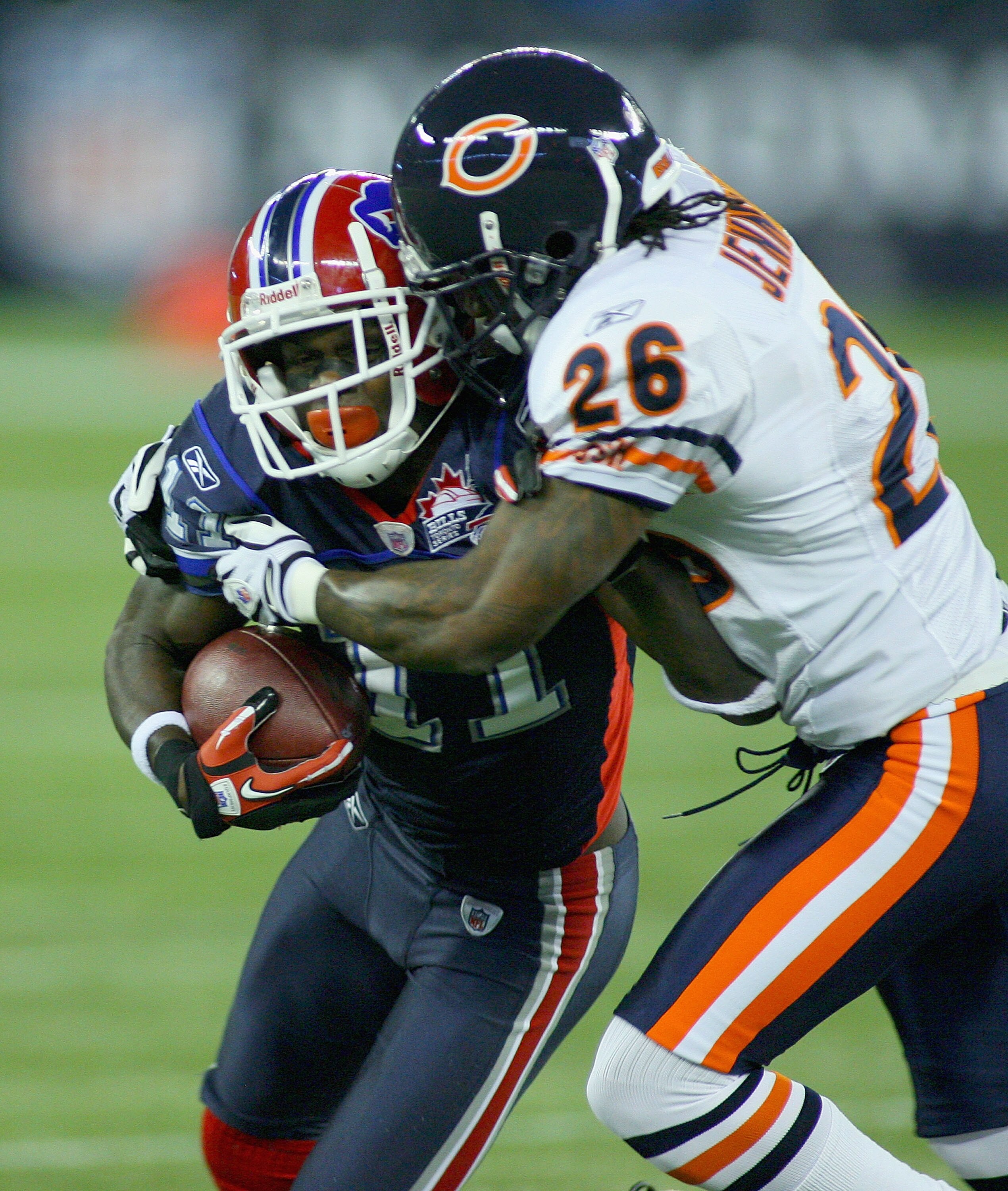 TORONTO, ON - NOVEMBER 07: Roscoe Parrish #11 of the Buffalo Bills is tackled by Tim Jennings #26 of the Chicago Bears at Rogers Centre on November 7, 2010 in Toronto, Canada.  (Photo by Rick Stewart/Getty Images)