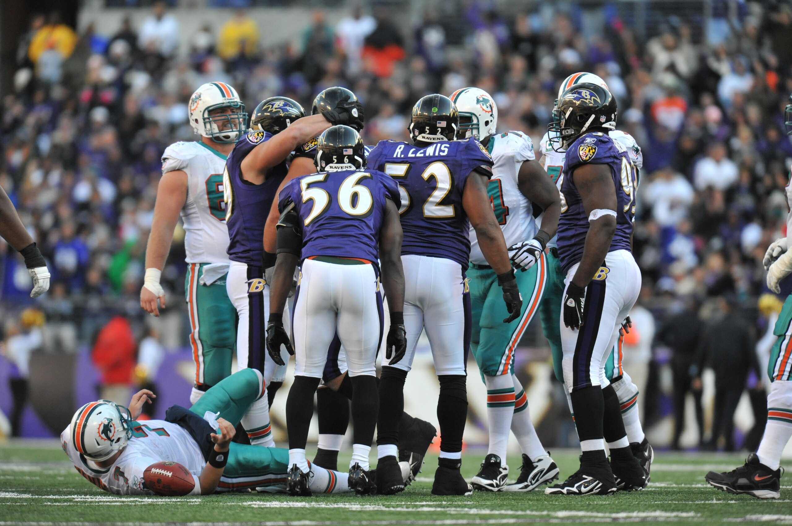 BALTIMORE, MD - NOVEMBER 7:  Chad Henne #7 of the Miami Dolphins lies on the ground after being sacked against the Baltimore Ravens at M&T Bank Stadium on November 7, 2010 in Baltimore, Maryland. The Ravens defeated the Dolphins 26-10. (Photo by Larry Fre