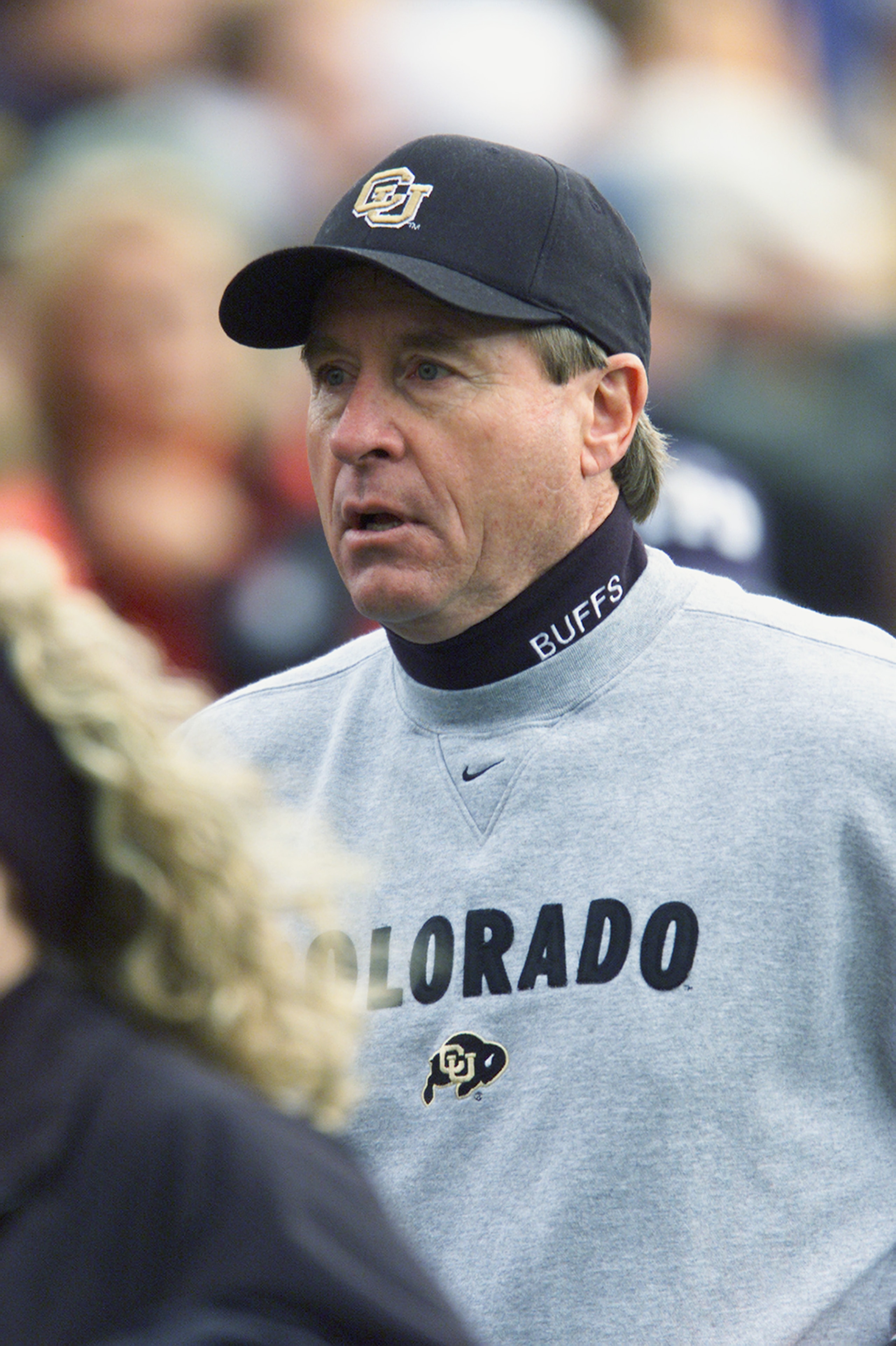 BOULDER, CO - NOVEMBER 23:  Head coach Gary Barnett of the Colorado Buffaloes jogs on the field during the Big 12 Conference football game against the Nebraska Cornhuskers on November 23, 2001 at Folsom Field in Boulder, Colorado.  The Buffaloes crushed t
