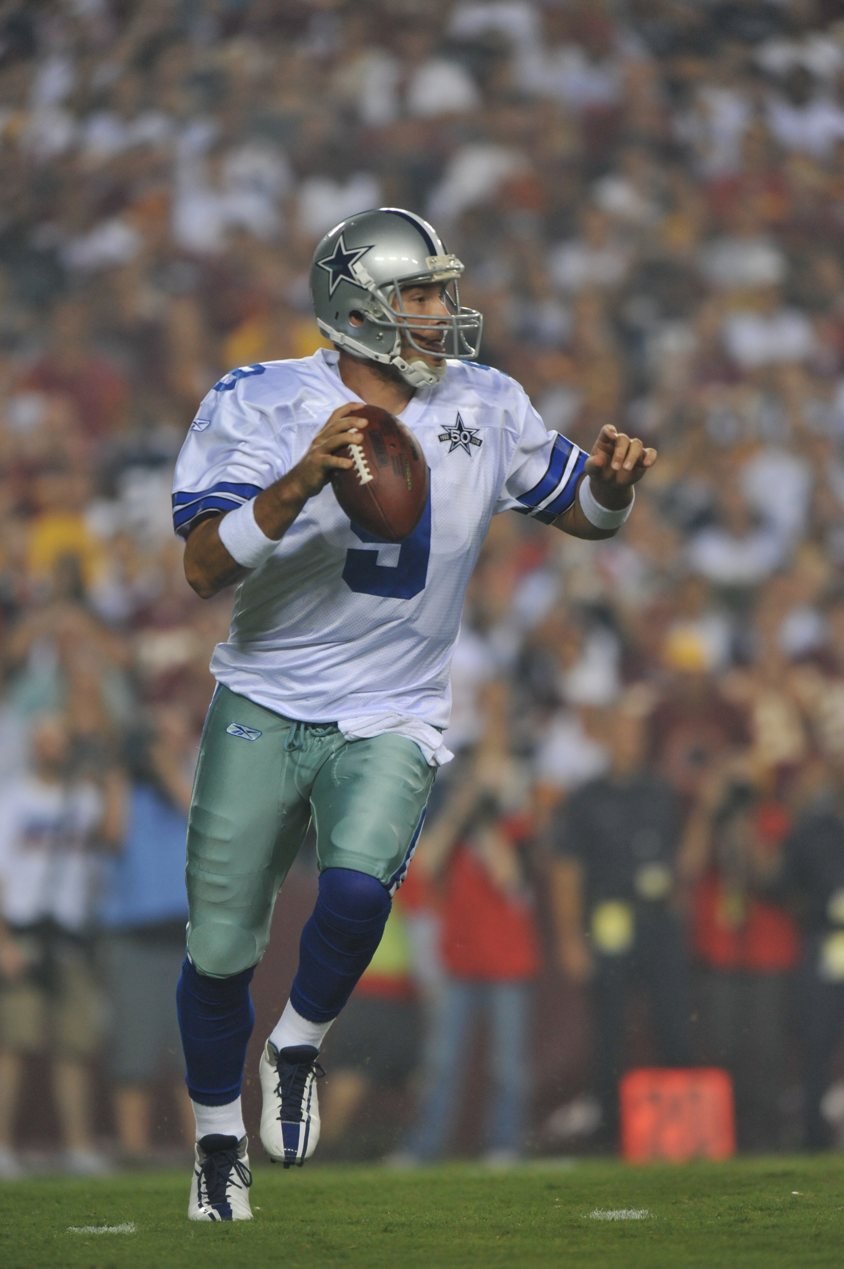 LANDOVER - SEPTEMBER 12:  Tony Romo #9 of the Dallas Cowboys passes during the NFL season opener against the Washington Redskins at FedExField on September 12, 2010 in Landover, Maryland. The Redskins defeated the Cowboys 13-7. (Photo by Larry French/Gett