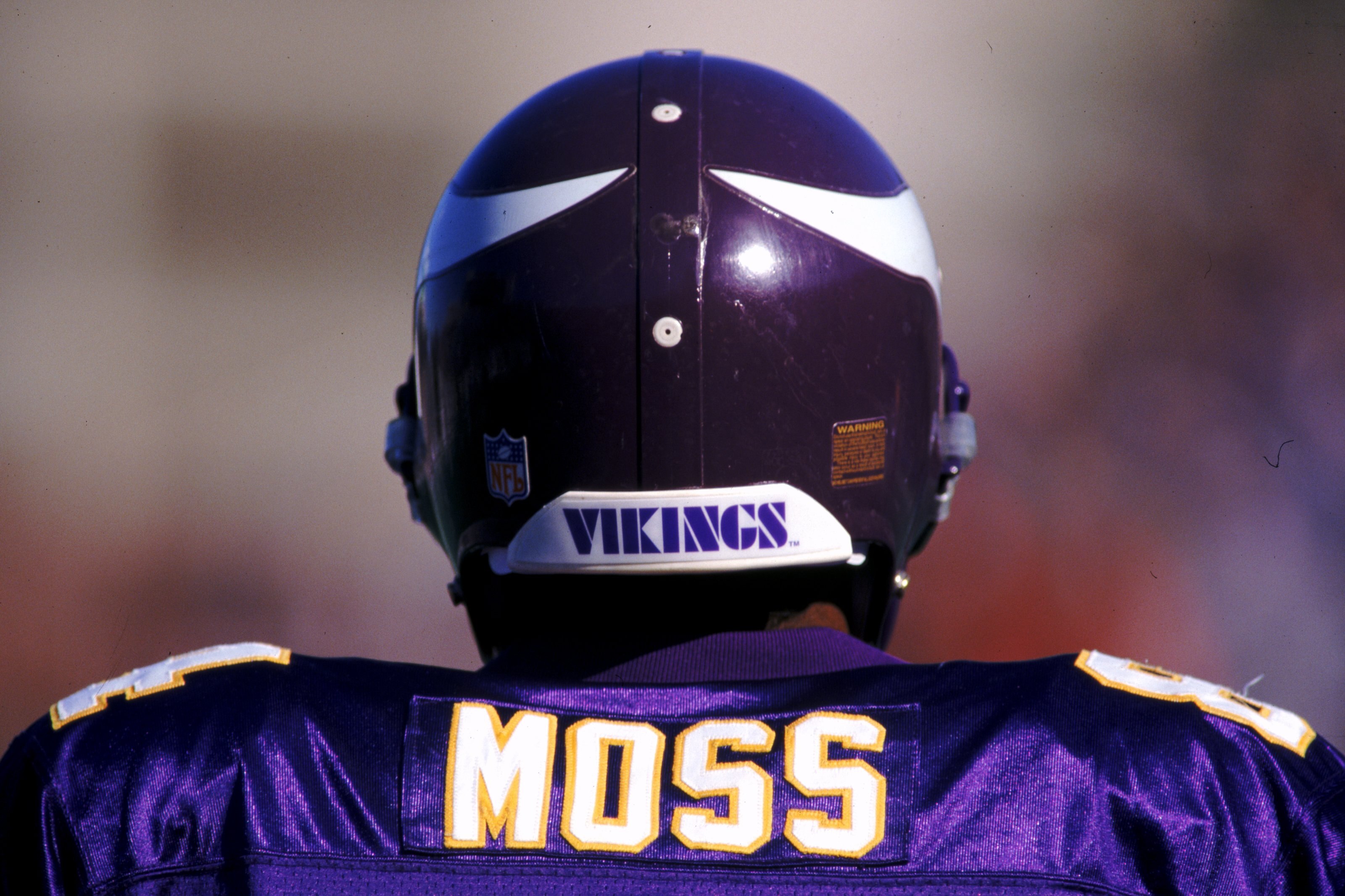 26 Dec 1998:   Randy Moss #84 of the Minnesota Vikings looks on the field during a game against the Nashville Oilers at the Vanderbilt Stadium in Nashville, Tennessee. The Vikings defeated the Oilers 26-16. Mandatory Credit: Scott Halleran  /Allsport