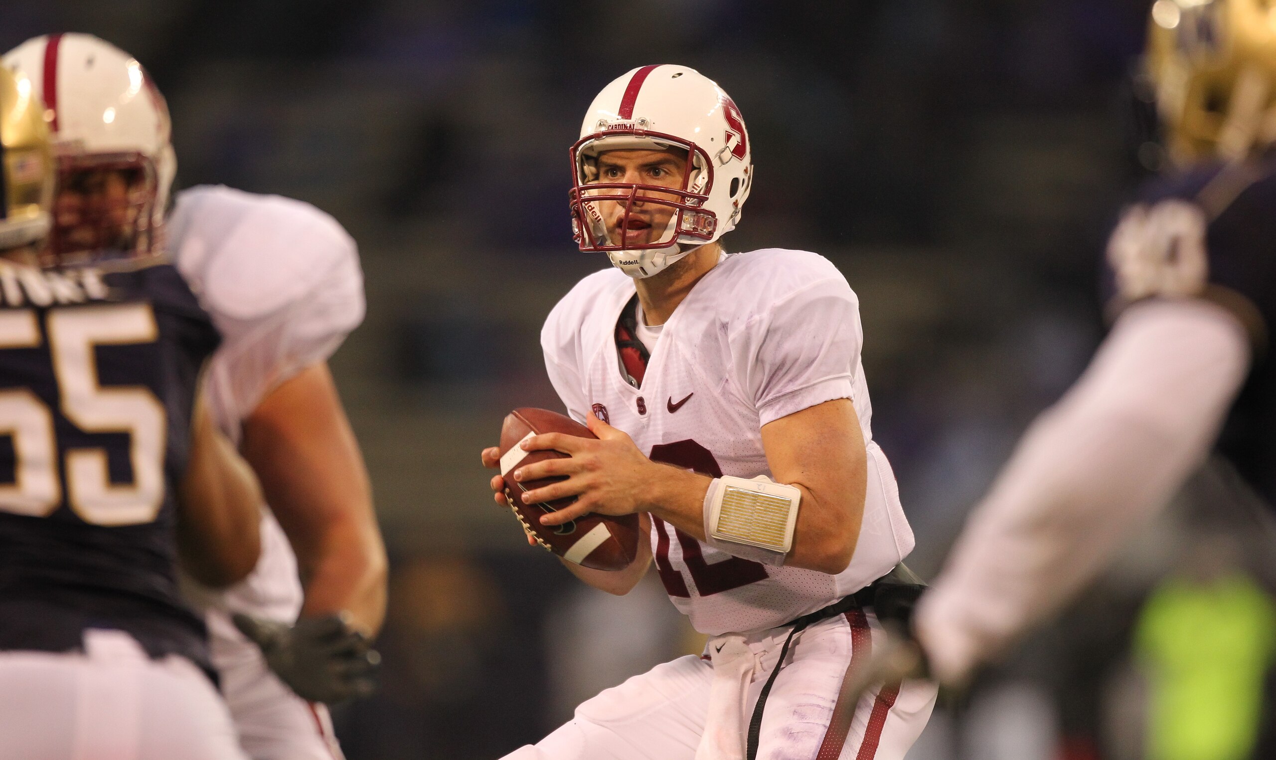 SEATTLE - OCTOBER 30:  Quarterback Andrew Luck #12 of the Stanford Cardinal drops back to pass against the Washington Huskies on October 30, 2010 at Husky Stadium in Seattle, Washington. Stanford won 41-0. (Photo by Otto Greule Jr/Getty Images)