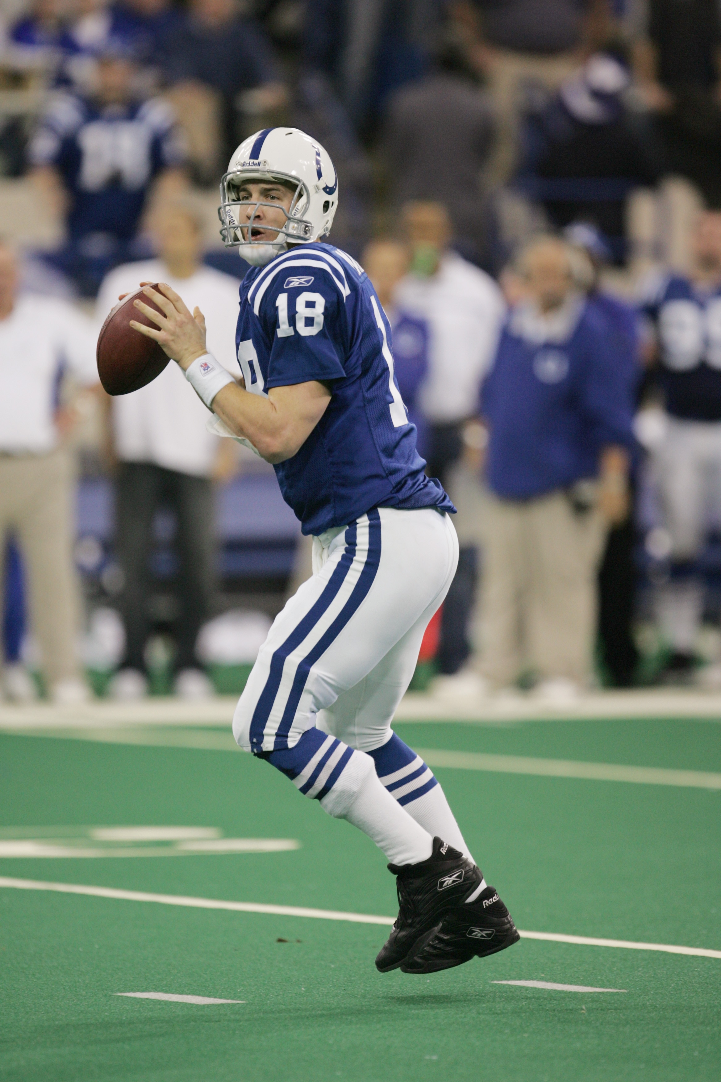 INDIANAPOLIS - DECEMBER 26:  Peyton Manning #18 of the Indianapolis Colts looks to pass against the San Diego Chargers on December 26, 2004 at the RCA Dome in Indianapolis, Indiana.  Peyton Manning passed Dan Marino as he threw his NFL regular season reco