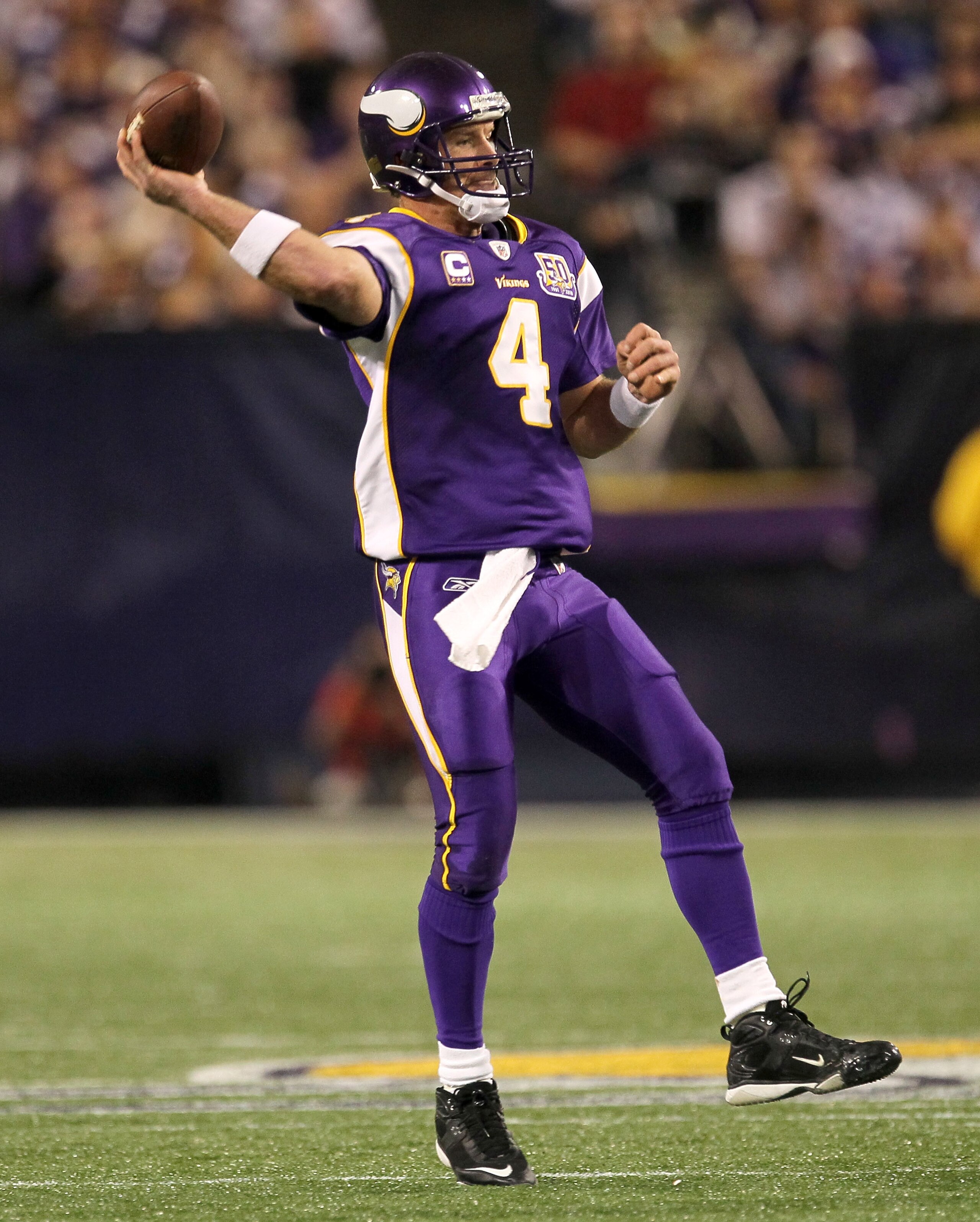 MINNEAPOLIS - NOVEMBER 07: Quarterback Brett Favre #4 of the Minnesota Vikings throws a pass against the Arizona Cardinals at Hubert H. Humphrey Metrodome on November 7, 2010 in Minneapolis, Minnesota. The Vikings won 27-24 in overtime. (Photo by Steph MINNEAPOLIS - NOVEMBER 07: Quarterback Brett Favre #4 of the Minnesota Vikings throws a pass against the Arizona Cardinals at Hubert H. Humphrey Metrodome on November 7, 2010 in Minneapolis, Minnesota. The Vikings won 27-24 in overtime. (Photo by Steph