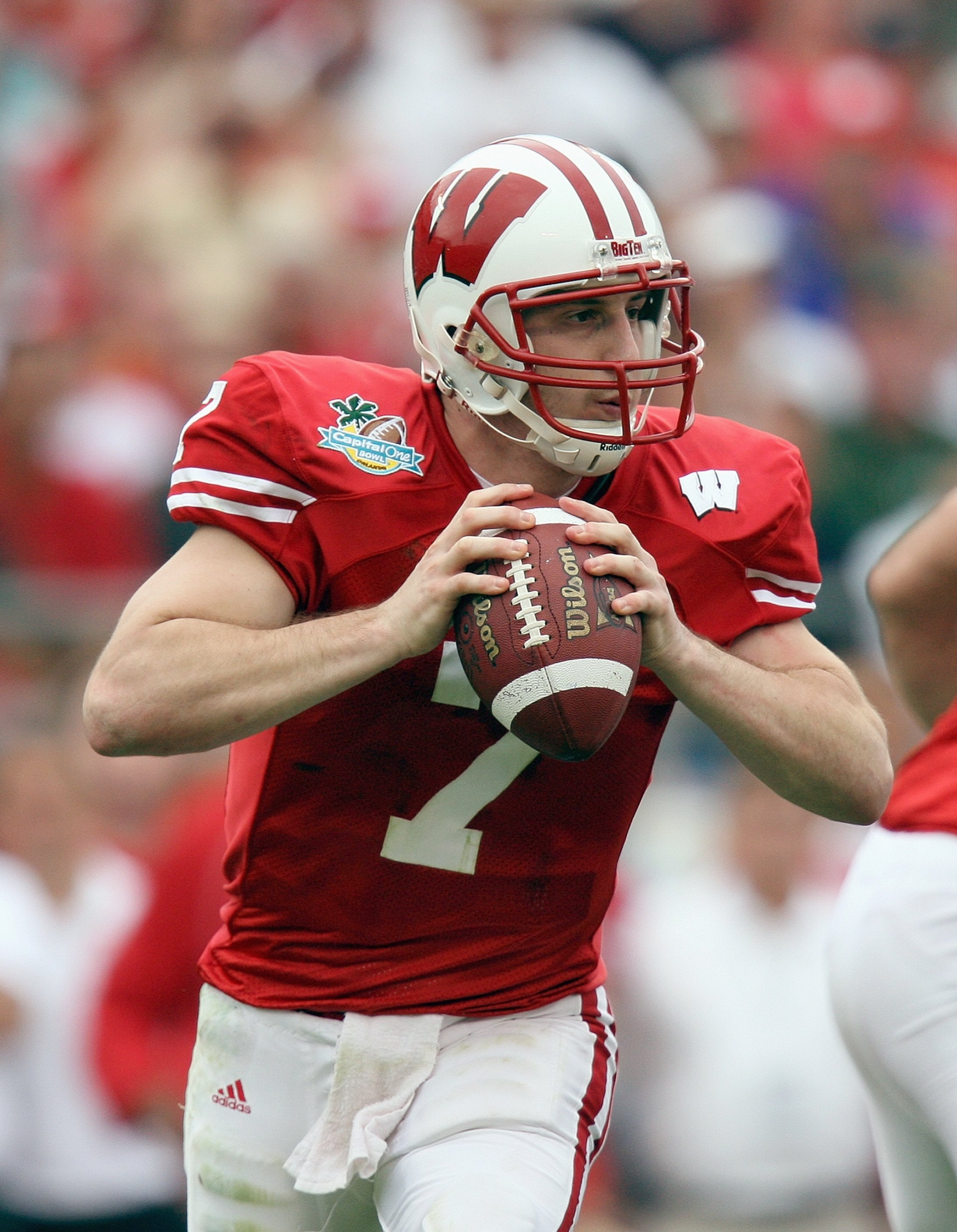 ORLANDO, FL - JANUARY 01: John Stocco #7 of the Wisconsin Badgers looks to pass the ball against the Arkansas Razorbacks in the Capitol One Bowl at Florida Citrus Bowl on January 1, 2007 in Orlando, Florida. (Photo by Doug Benc/Getty Images)