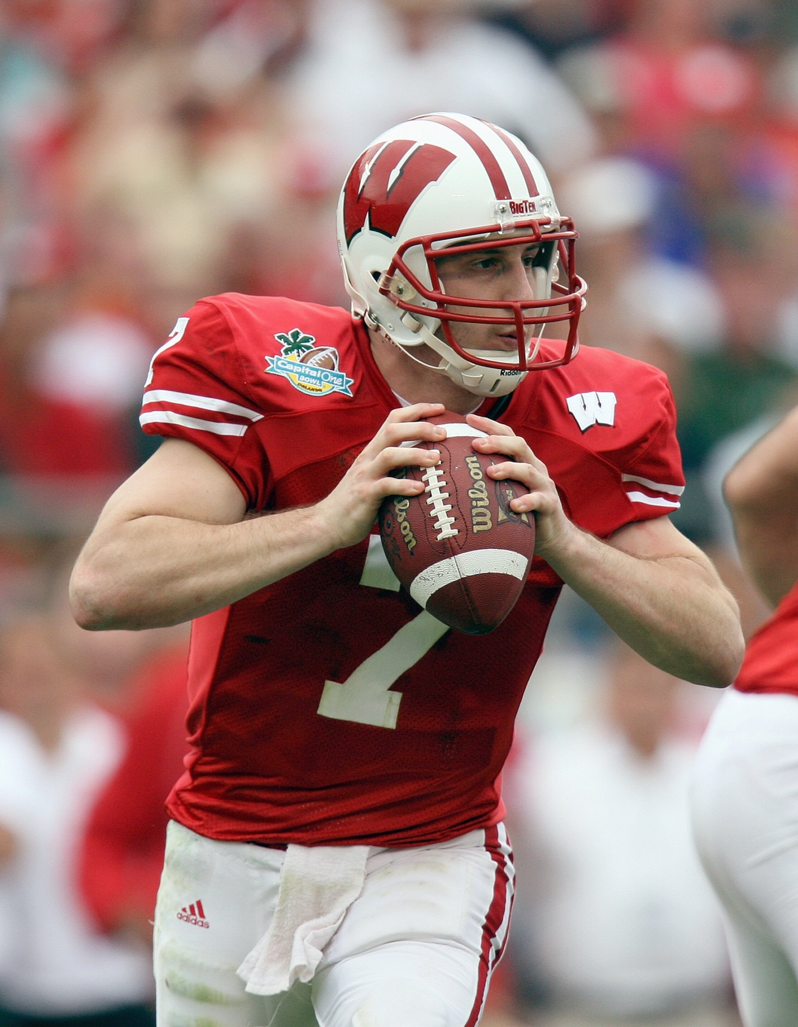 ORLANDO, FL - JANUARY 01: John Stocco #7 of the Wisconsin Badgers looks to pass the ball against the Arkansas Razorbacks in the Capitol One Bowl at Florida Citrus Bowl on January 1, 2007 in Orlando, Florida. (Photo by Doug Benc/Getty Images)
