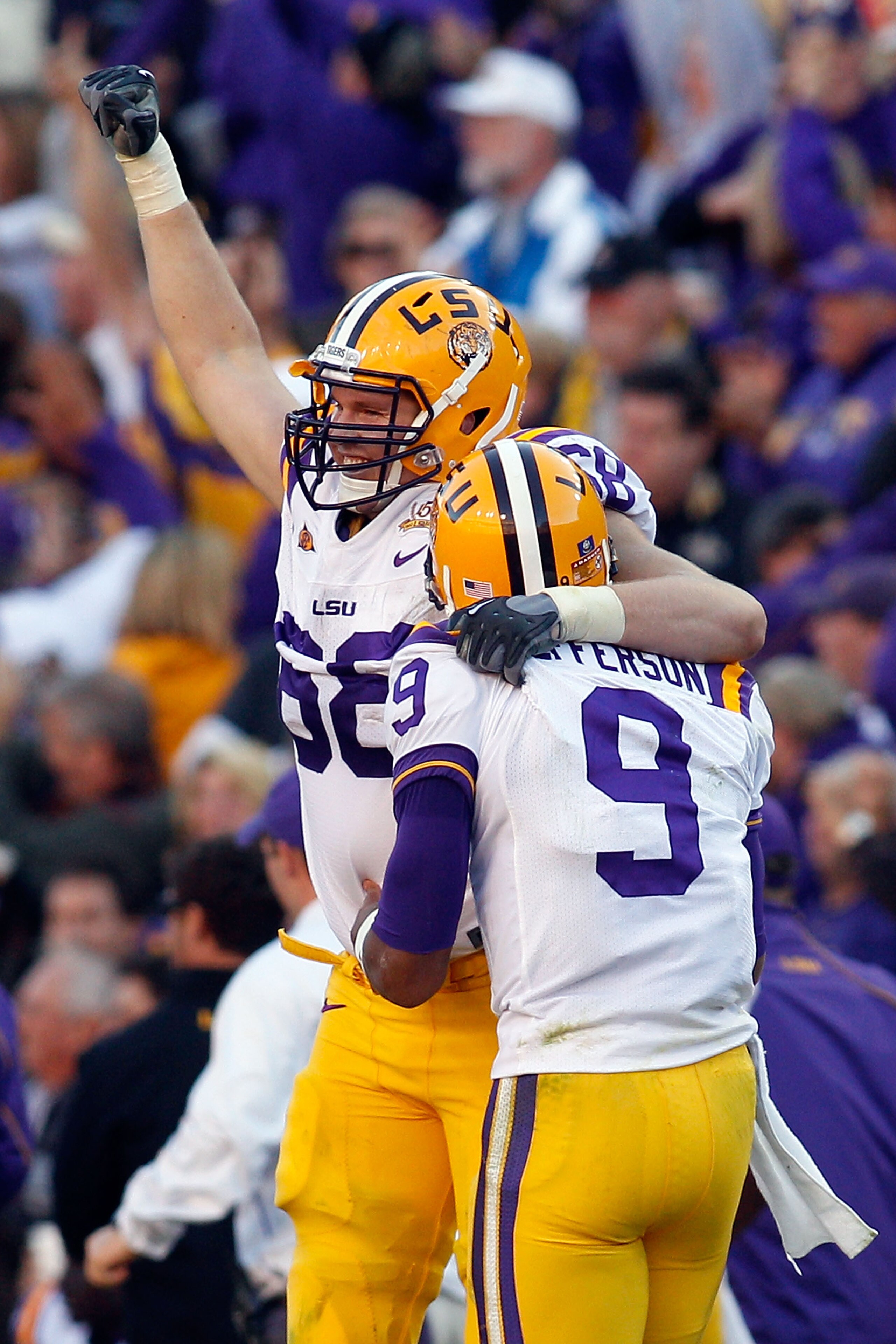 BATON ROUGE, LA - NOVEMBER 06: Josh Dworaczyk #68 and Jordan Jefferson #9 of the Louisiana State University Tigers celebrate after scoring a touchdown against the Alabama Crimson Tide at Tiger Stadium on November 6, 2010 in Baton Rouge, Louisiana. The Ti BATON ROUGE, LA - NOVEMBER 06: Josh Dworaczyk #68 and Jordan Jefferson #9 of the Louisiana State University Tigers celebrate after scoring a touchdown against the Alabama Crimson Tide at Tiger Stadium on November 6, 2010 in Baton Rouge, Louisiana. The Ti