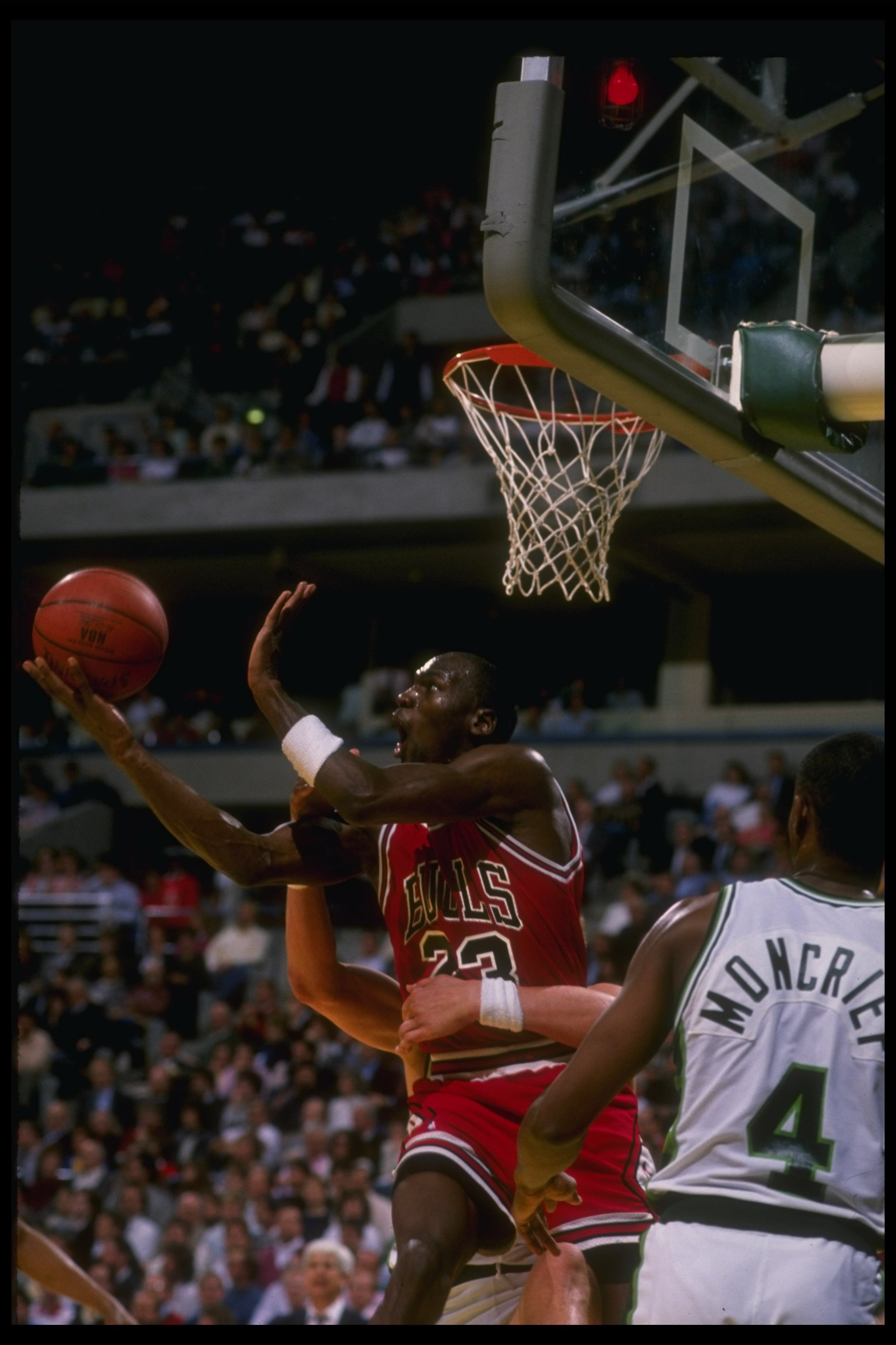 Guard Michael Jordan of the Chicago Bulls (center).
