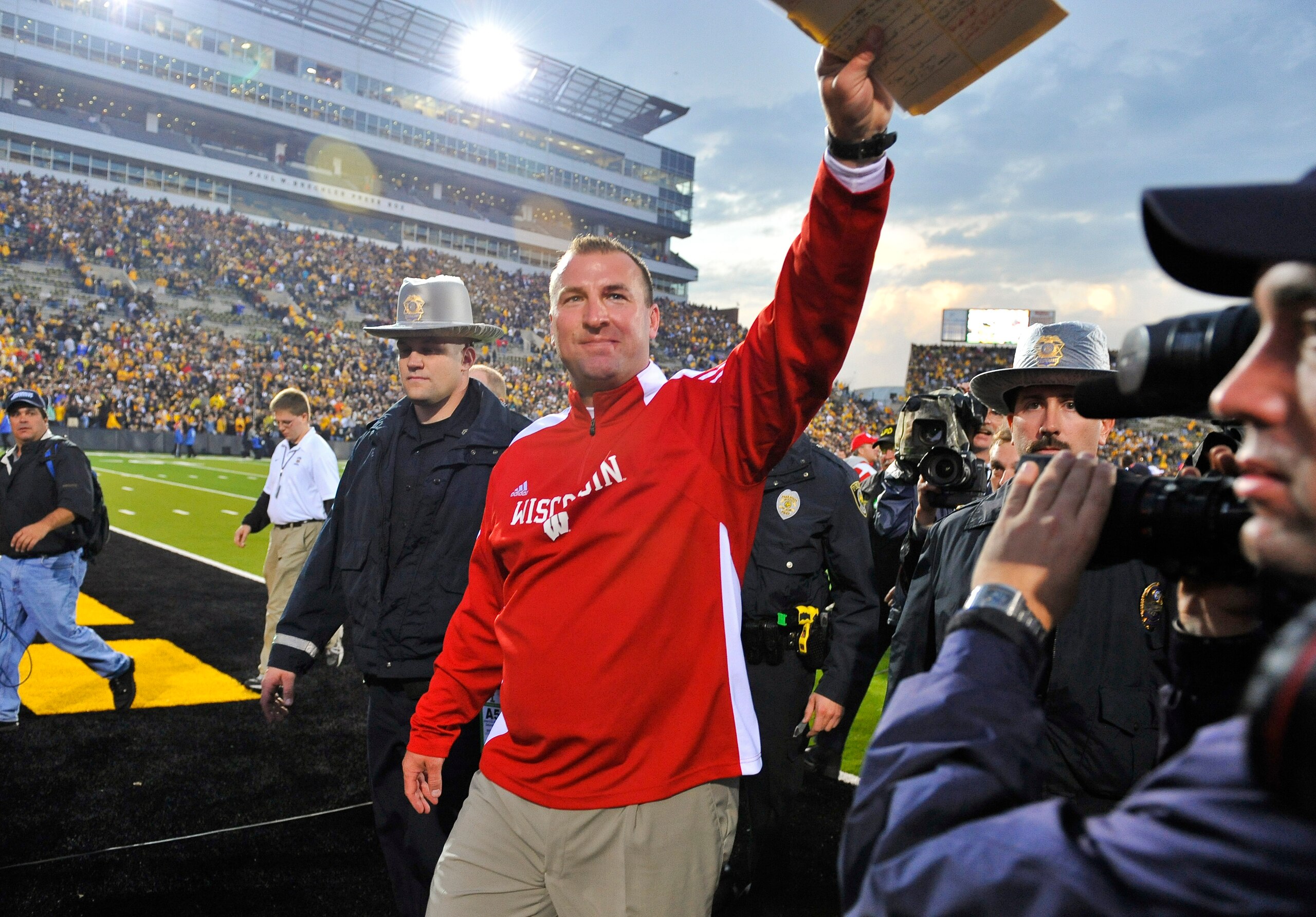 IOWA CITY, IA - OCTOBER 23: Wisconsin Badgers head coach Bret Bielema waves to fans after after his victory over the University of Iowa Hawkeyes at Kinnick Stadium on October 23, 2010 in Iowa City, Iowa. Wisconsin won 31-30 over Iowa. (Photo by David Purd