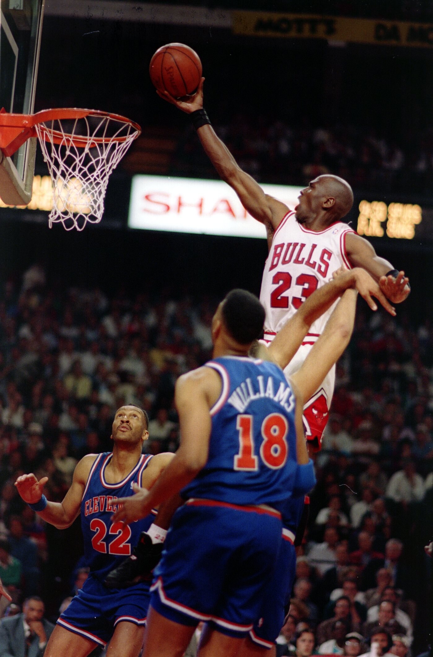 Chicago''s Michael Jordan rises above Cavaliers Larry Nance and John Wiliams during the Bulls'' 91-84 victory in the second round of the 1993 NBA playoffs. Mandatory Credit: Jonathan Daniel/ALLSPORT
