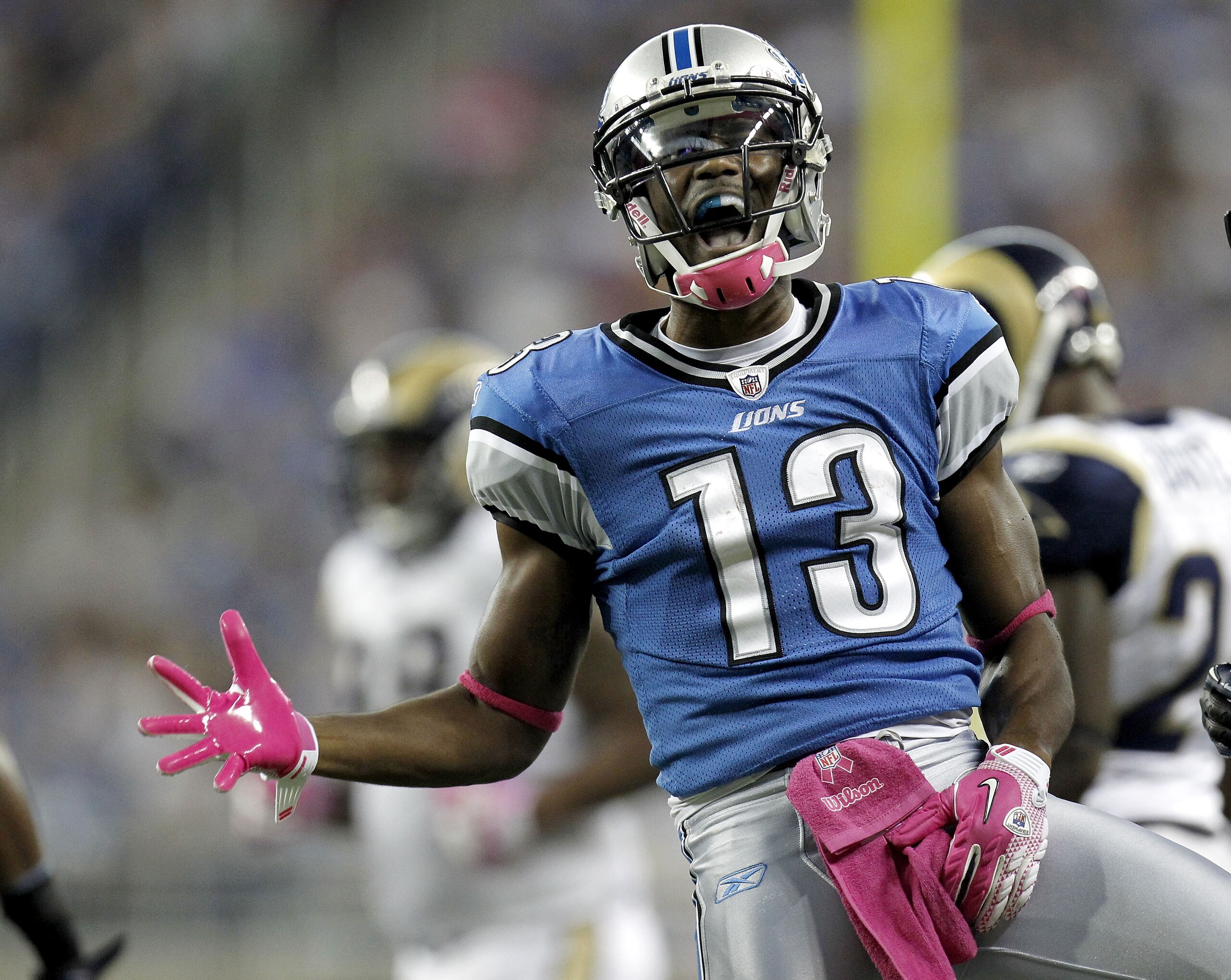 DETROIT - OCTOBER 10: Nate Burleson #13 of the Detroit Lions reacts after catching a second quarter pass for a first down while playing the St. Louis Rams on October 10, 2010 at Ford Field in Detroit, Michigan.  (Photo by Gregory Shamus/Getty Images)