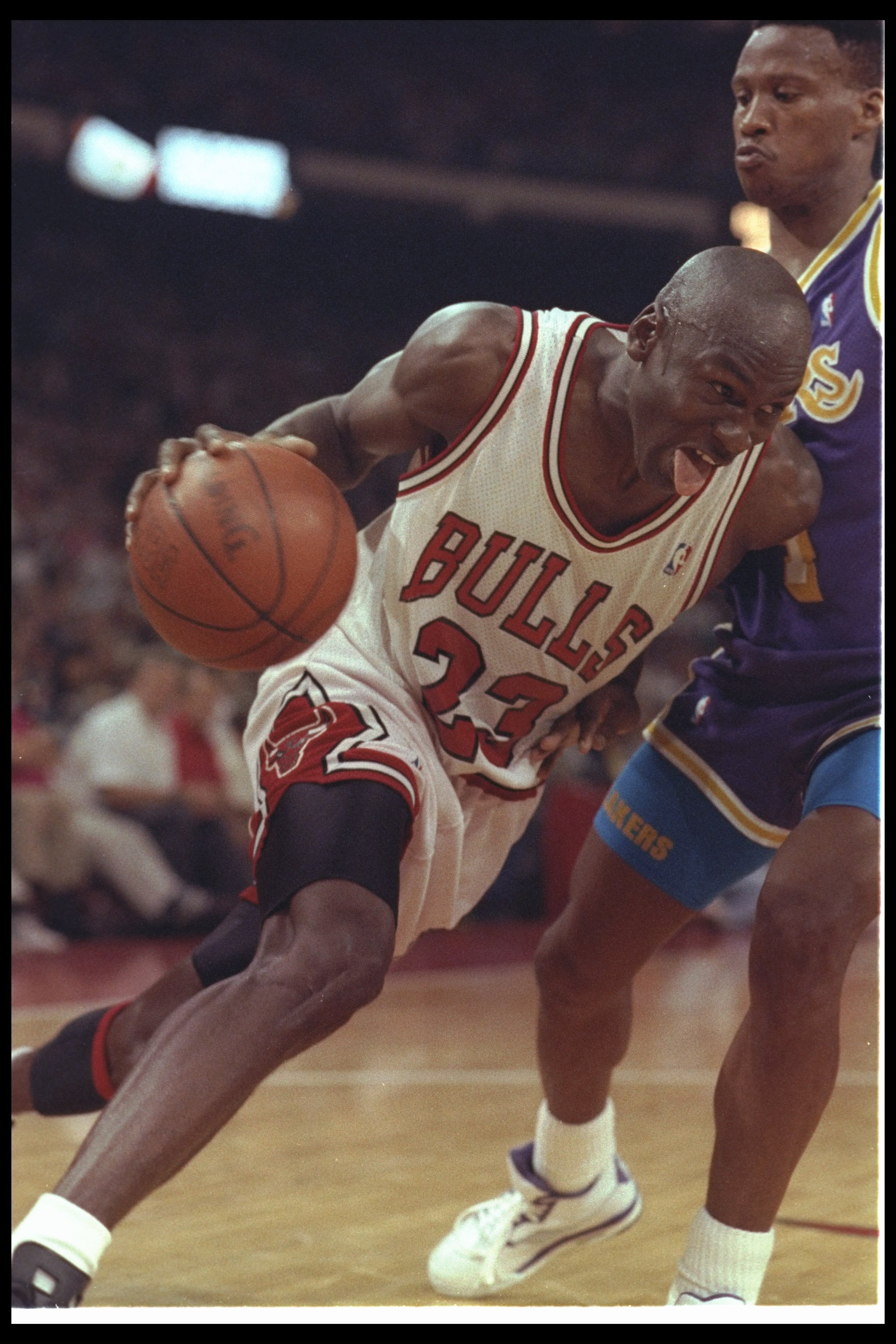 2 May 1991: Guard Michael Jordan of the Chicago Bulls works against the Los Angeles Lakers during Game One of the NBA finals at the United Center in Chicago, Illinois. The Lakers won the game, 93-91.