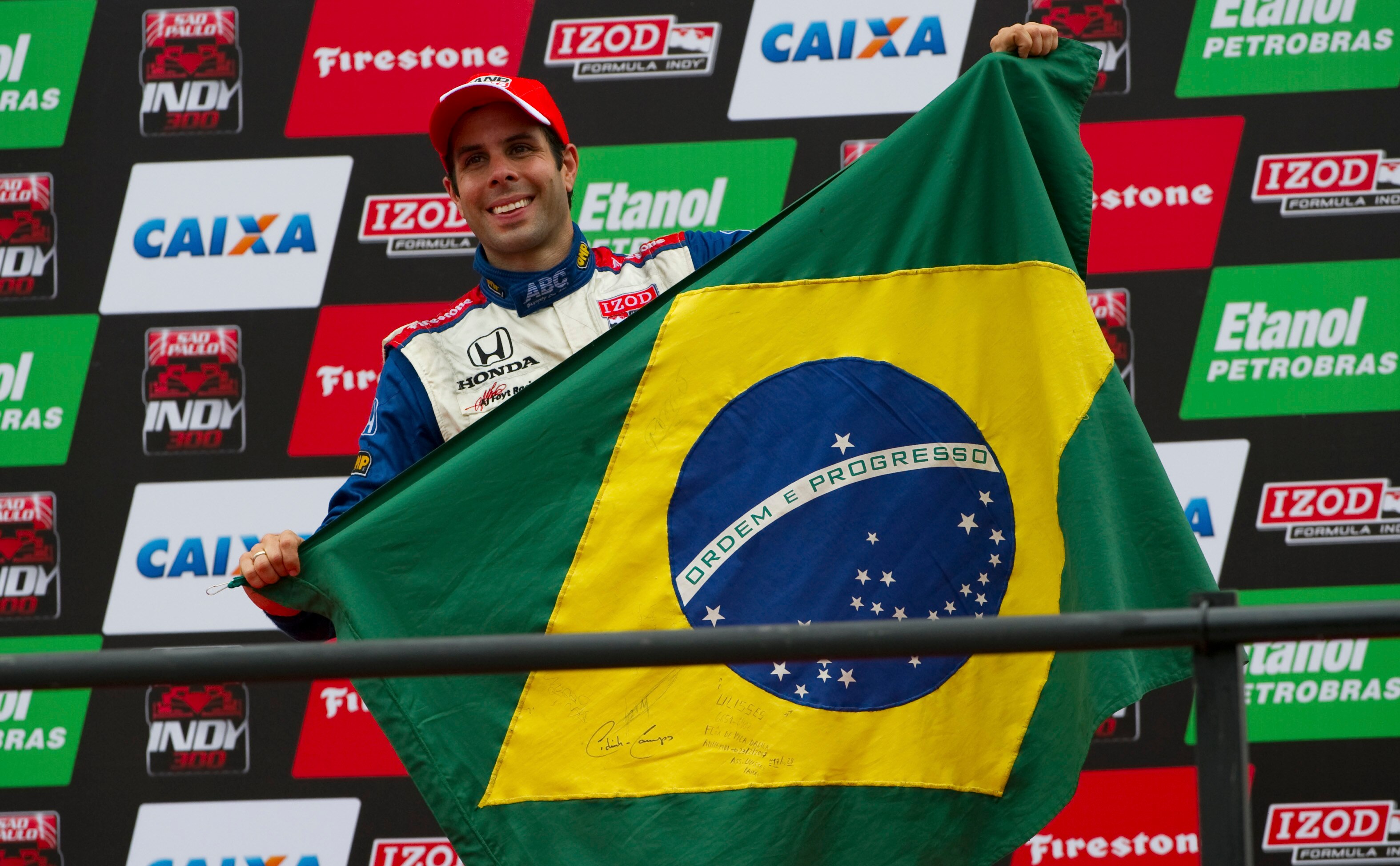 SAO PAULO, BRAZIL - MARCH 14:  Vitor Meira celebrates his third place finish during the IZOD IndyCar Series Sao Paulo Indy 300 on March 14, 2010 in the streets of Sao Paulo in Sao Paulo, Brazil.  (Photo by Robert Laberge/Getty Images)