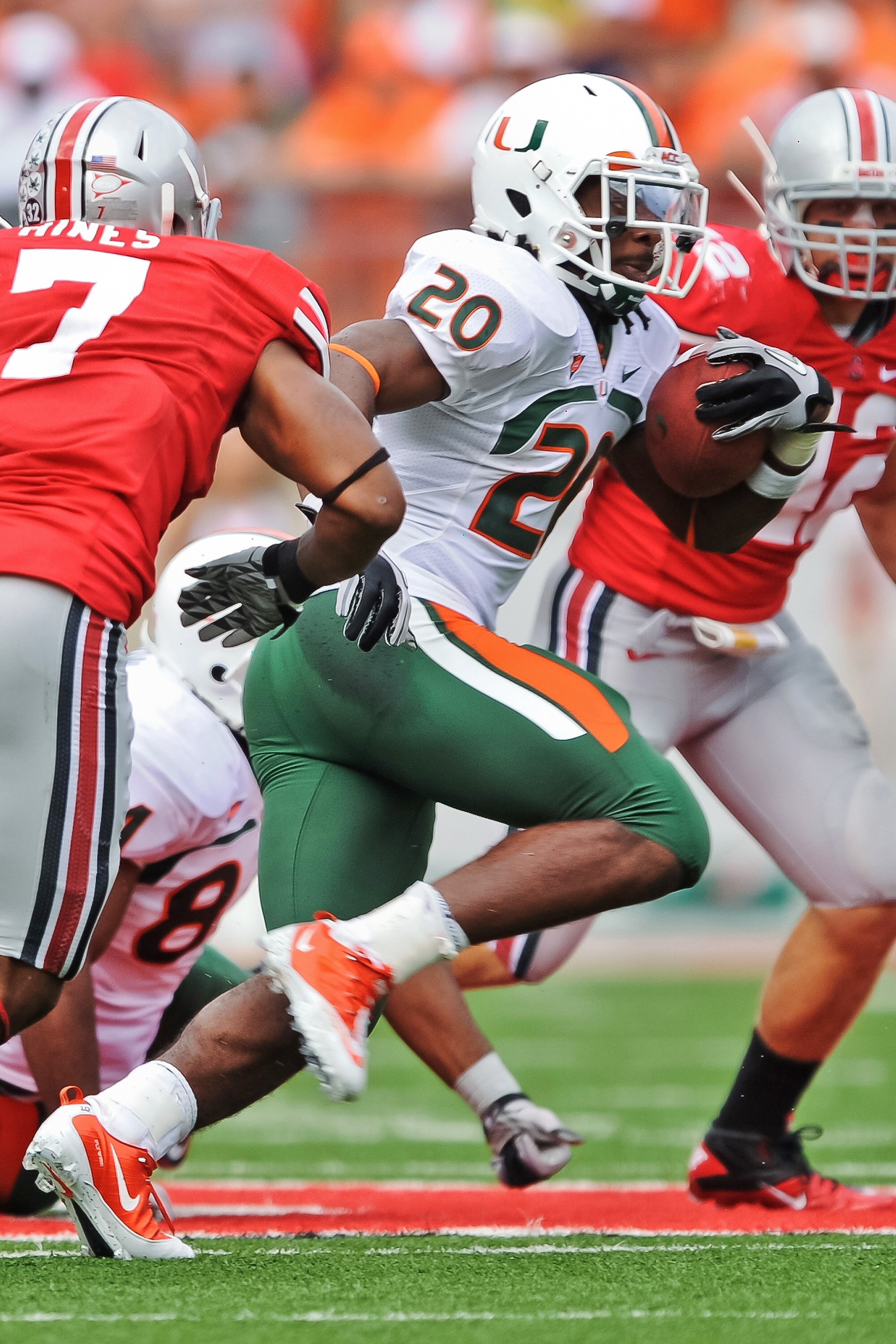 COLUMBUS, OH - SEPTEMBER 11:  Damien Berry #20 of the Miami Hurricanes runs with the ball against the Ohio State Buckeyes at Ohio Stadium on September 11, 2010 in Columbus, Ohio.  (Photo by Jamie Sabau/Getty Images)