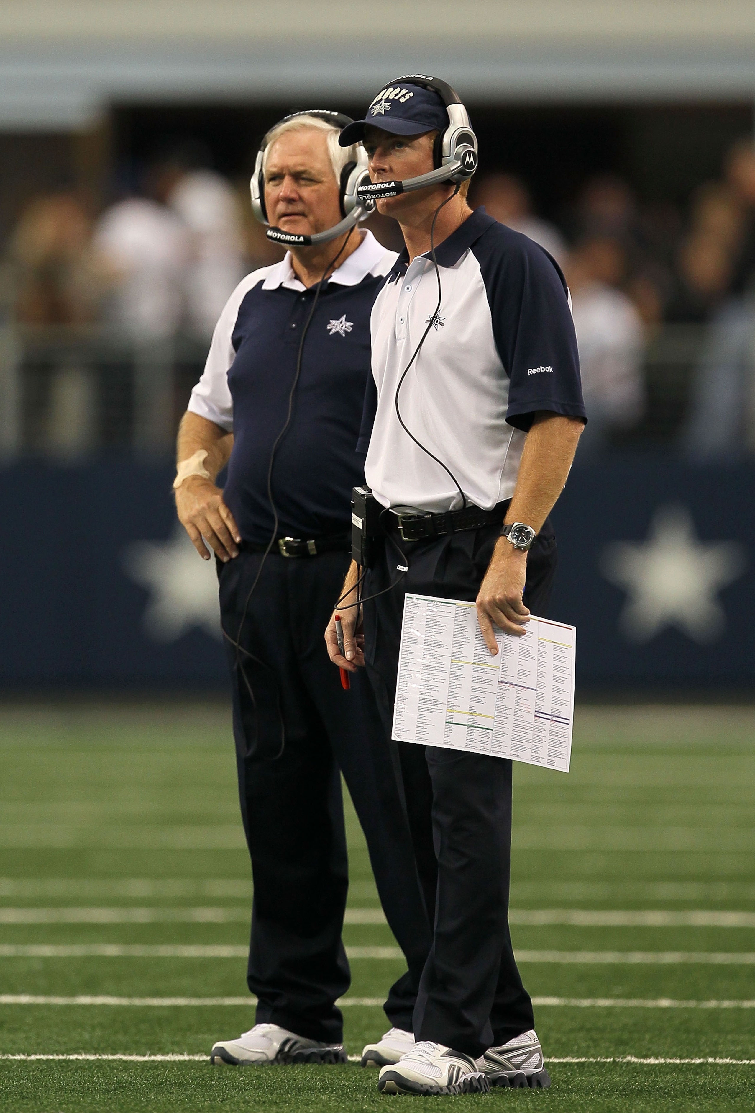 ARLINGTON, TX - OCTOBER 31:  (L-R) Head coach Wade Phillips and assistant head coach/offensive coordinator Jason Garrett of the Dallas Cowboys looks on against the Jacksonville Jaguars at Cowboys Stadium on October 31, 2010 in Arlington, Texas.  (Photo by