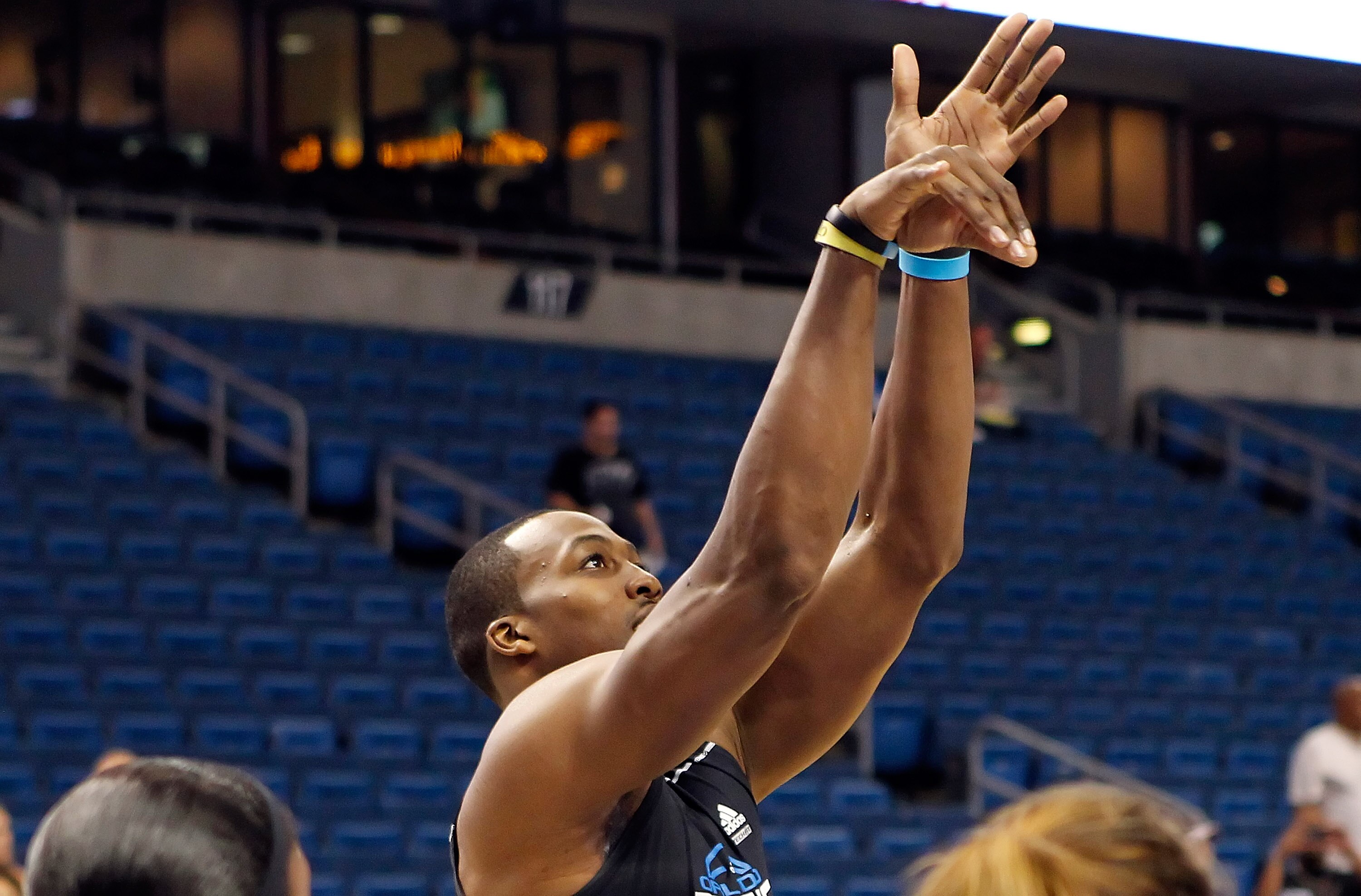 TAMPA, FL - OCTOBER 22:  Center Dwight Howard #12 of the Orlando Magic warms up prior to game against the Miami Heat at the St. Pete Times Forum on October 22, 2010 in Tampa, Florida. The game was cancelled due to a slippery floor.  NOTE TO USER: User exp