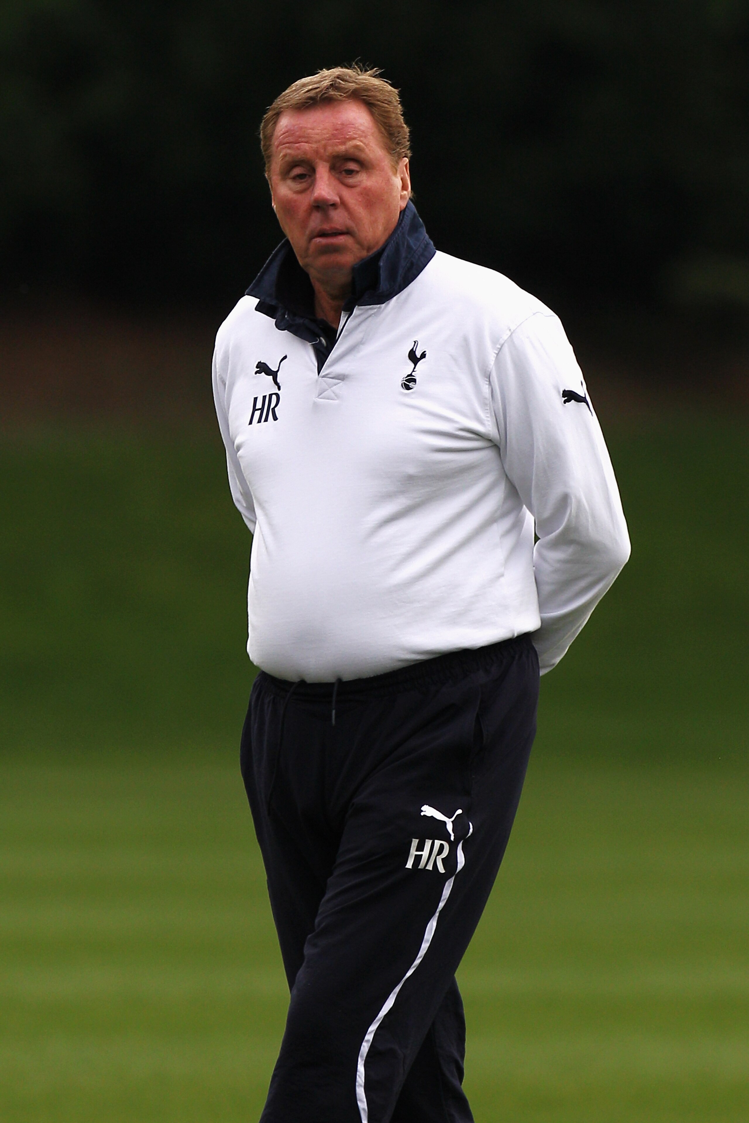 LONDON, ENGLAND - NOVEMBER 01:  Tottenham Manager,  Harry Redknapp looks on during the Tottenham Hotspur training session ahead of their UEFA Champions League group stage match against Inter Milan at Tottenham Hotspur Training Ground on November 1, 2010 i
