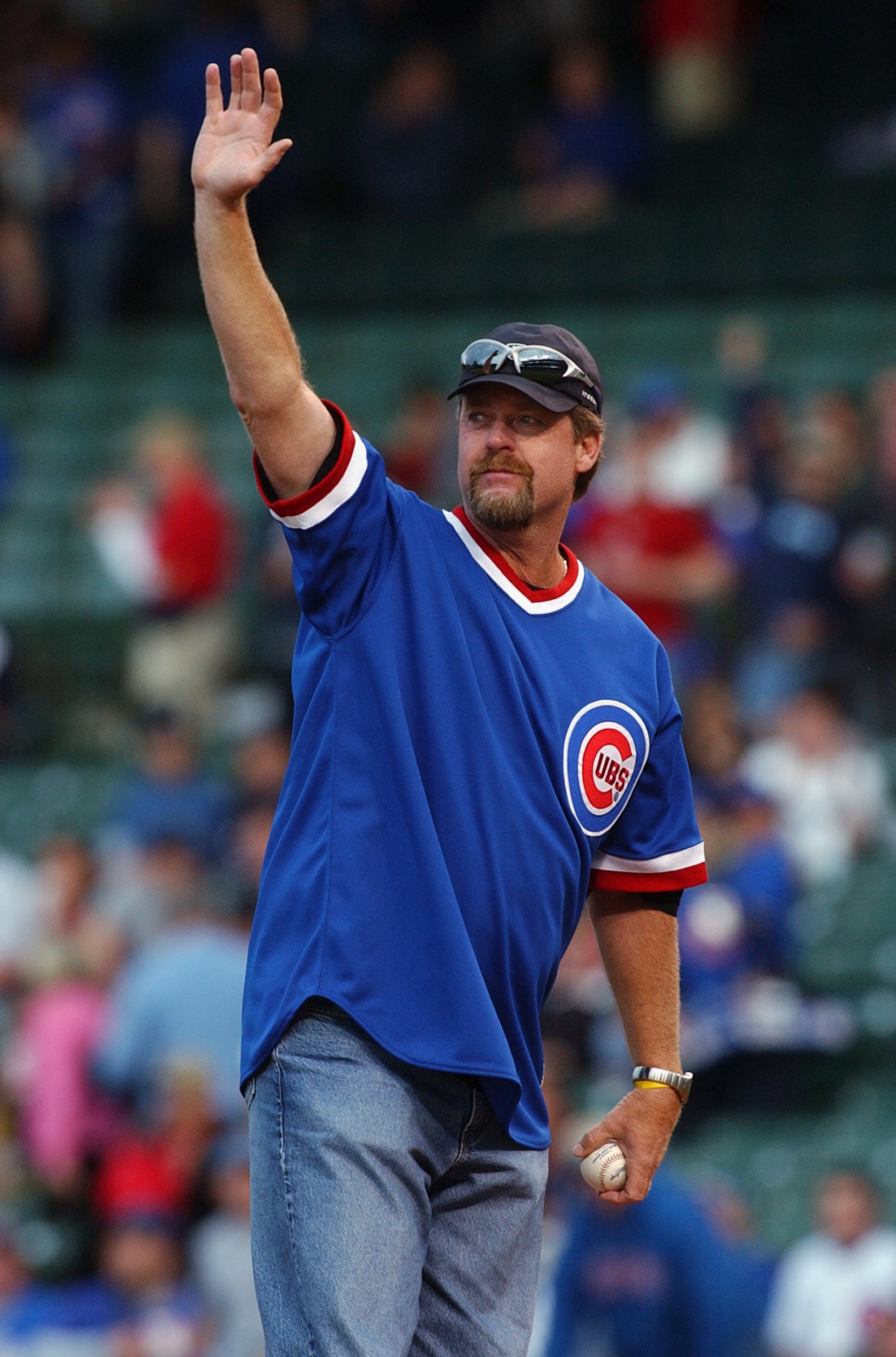 CHICAGO - JUNE 1:  Former Chicago Cubs pitcher Rick Sutcliffe now an ESPN Announcer, throws out the first pitch before the game between the Houston Astros and the Chicago Cubs on June 1, 2004 at Wrigley Field in Chicago, Illinois. The Astros defeated the