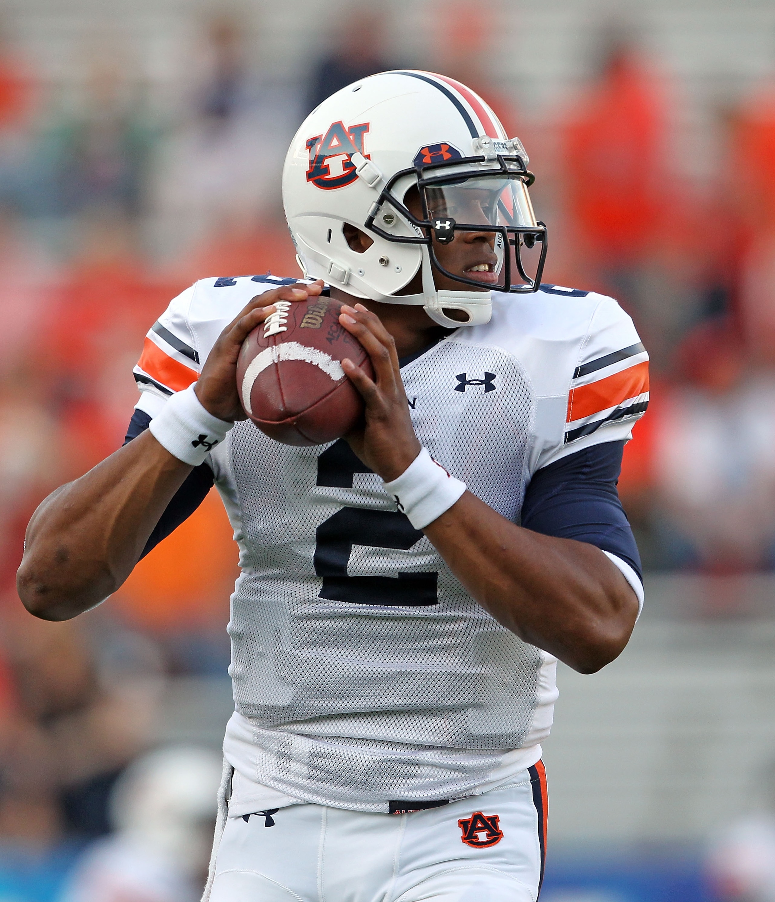 LEXINGTON, KY - OCTOBER 09:  Cam Newton #2 of the Auburn Tigers throws a pass as he warms up before the SEC game against the Kentucky Wildcats at Commonwealth Stadium on October 9, 2010 in Lexington, Kentucky.  (Photo by Andy Lyons/Getty Images)