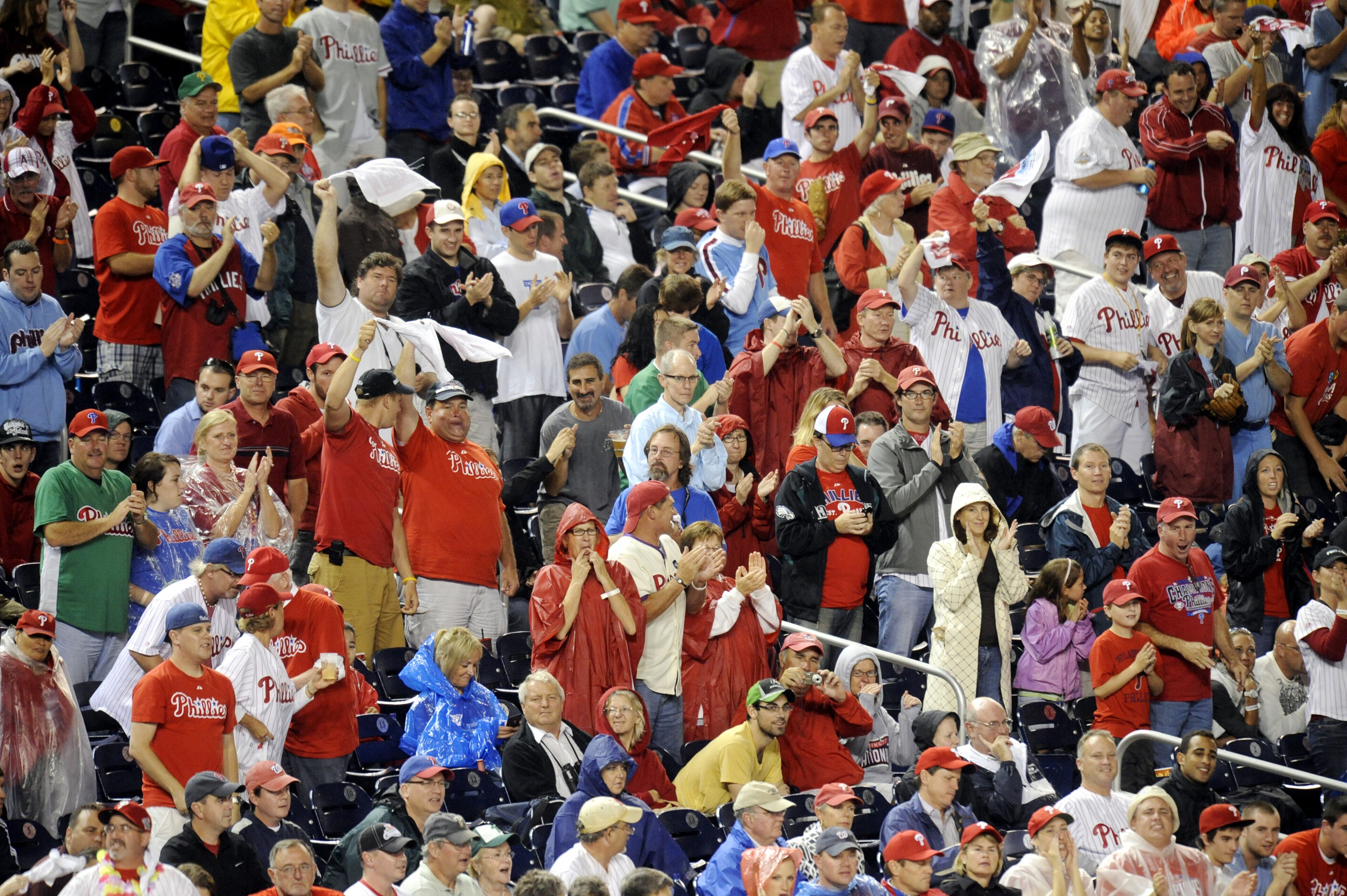 WASHINGTON - SEPTEMBER 27:  Philadelphia Phillies fans cheer during a baseball game against the Washington Nationals on September 27, 2010 at Nationals Park in Washington, D.C.    (Photo by Mitchell Layton/Getty Images)