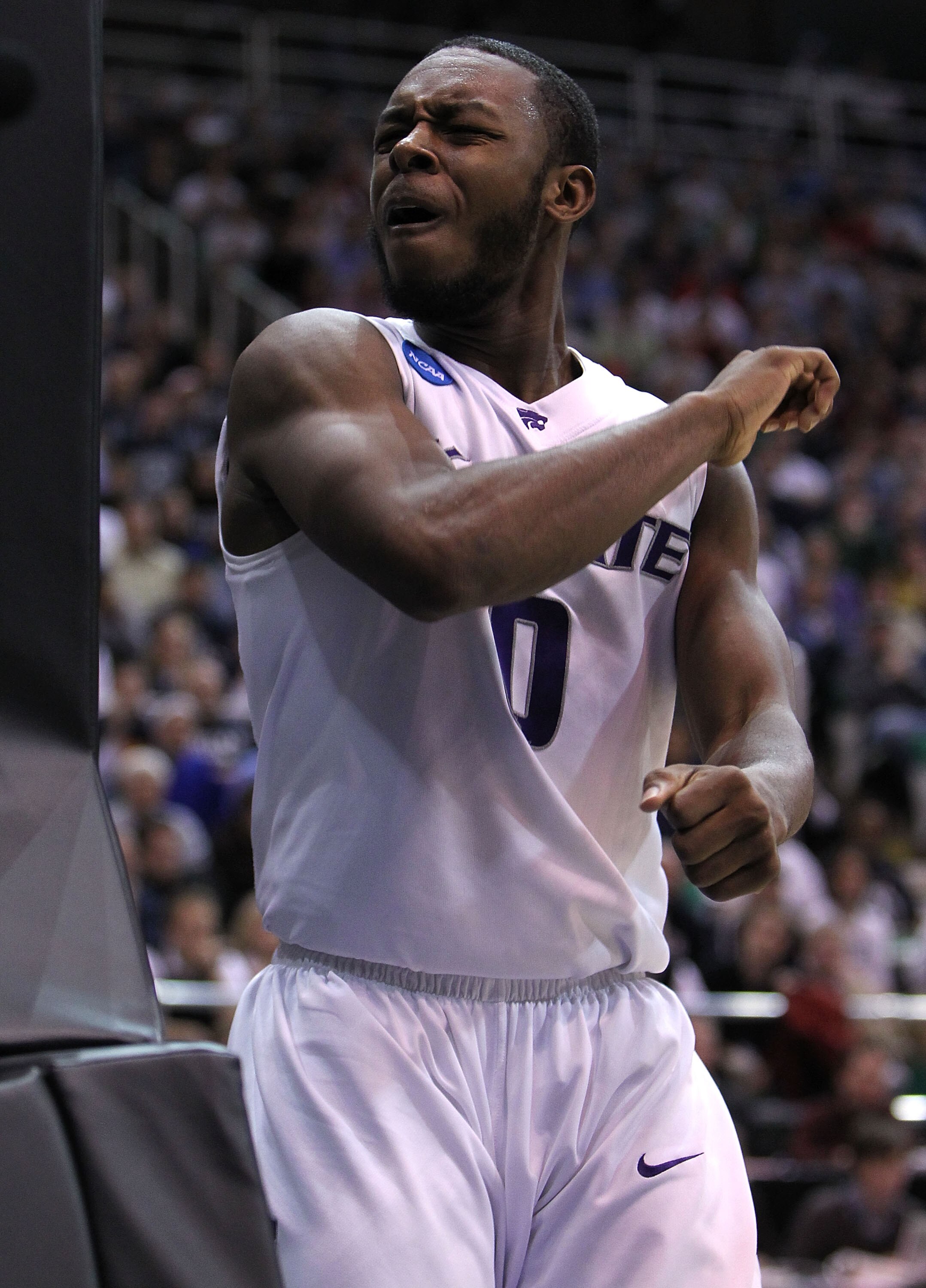 SALT LAKE CITY - MARCH 27:  Jacob Pullen #0 of the Kansas State Wildcats argues a call against the Butler Bulldogs during the west regional final of the 2010 NCAA men's basketball tournament at the Energy Solutions Arena on March 27, 2010 in Salt Lake Cit