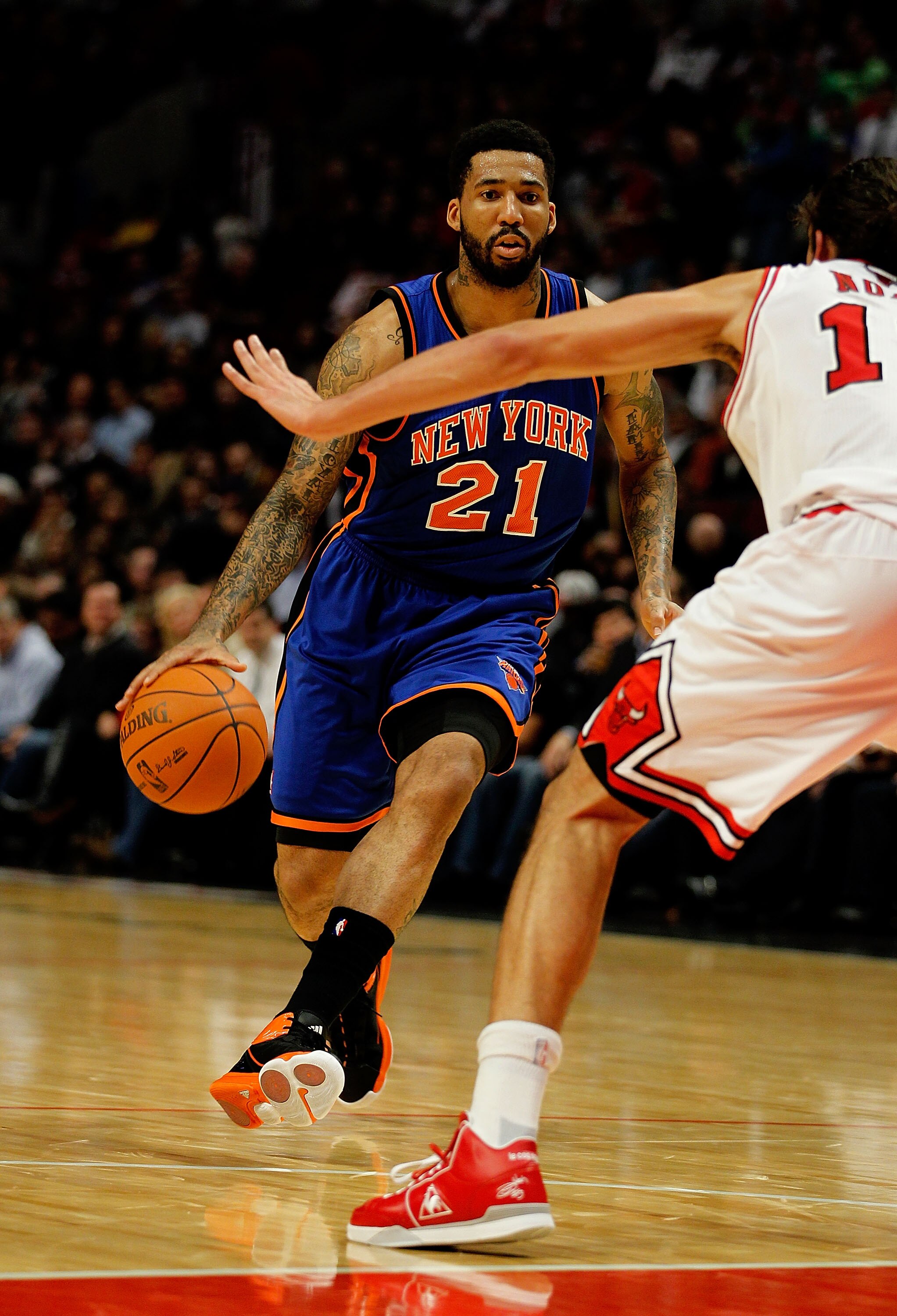 CHICAGO - NOVEMBER 04: Wilson Chandler #21 of the New York Knicks moves toward Joakim Noah #13 of the Chicago Bulls at the United Center on November 4, 2010 in Chicago, Illinois. The Knicks defeated the Bulls 120-112. NOTE TO USER: User expressly acknowle