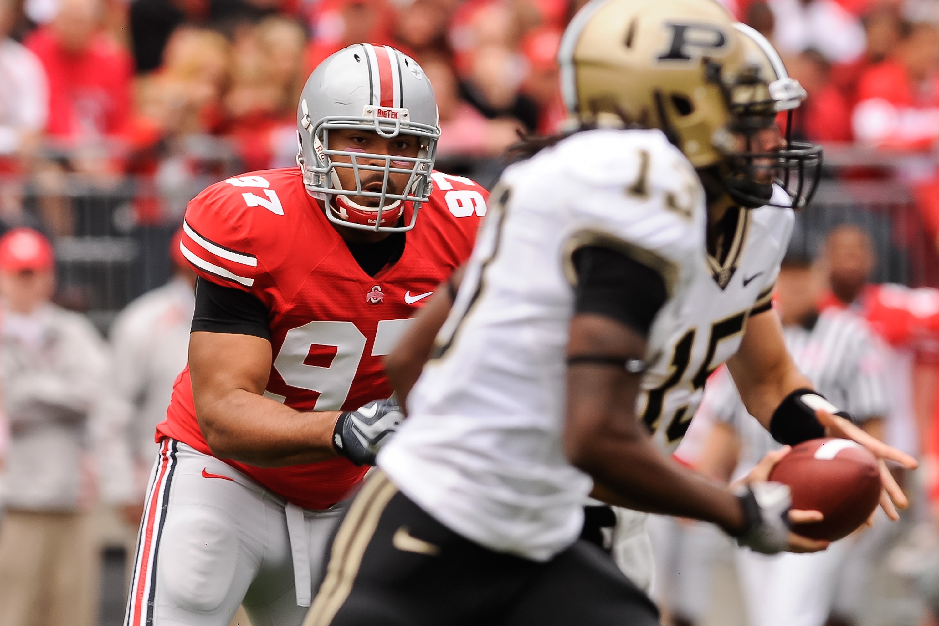 COLUMBUS, OH - OCTOBER 23:  Cameron Heyward #97 of the Ohio State Buckeyes chases after a Purdue Boilermaker ballcarrier at Ohio Stadium on October 23, 2010 in Columbus, Ohio.  (Photo by Jamie Sabau/Getty Images)