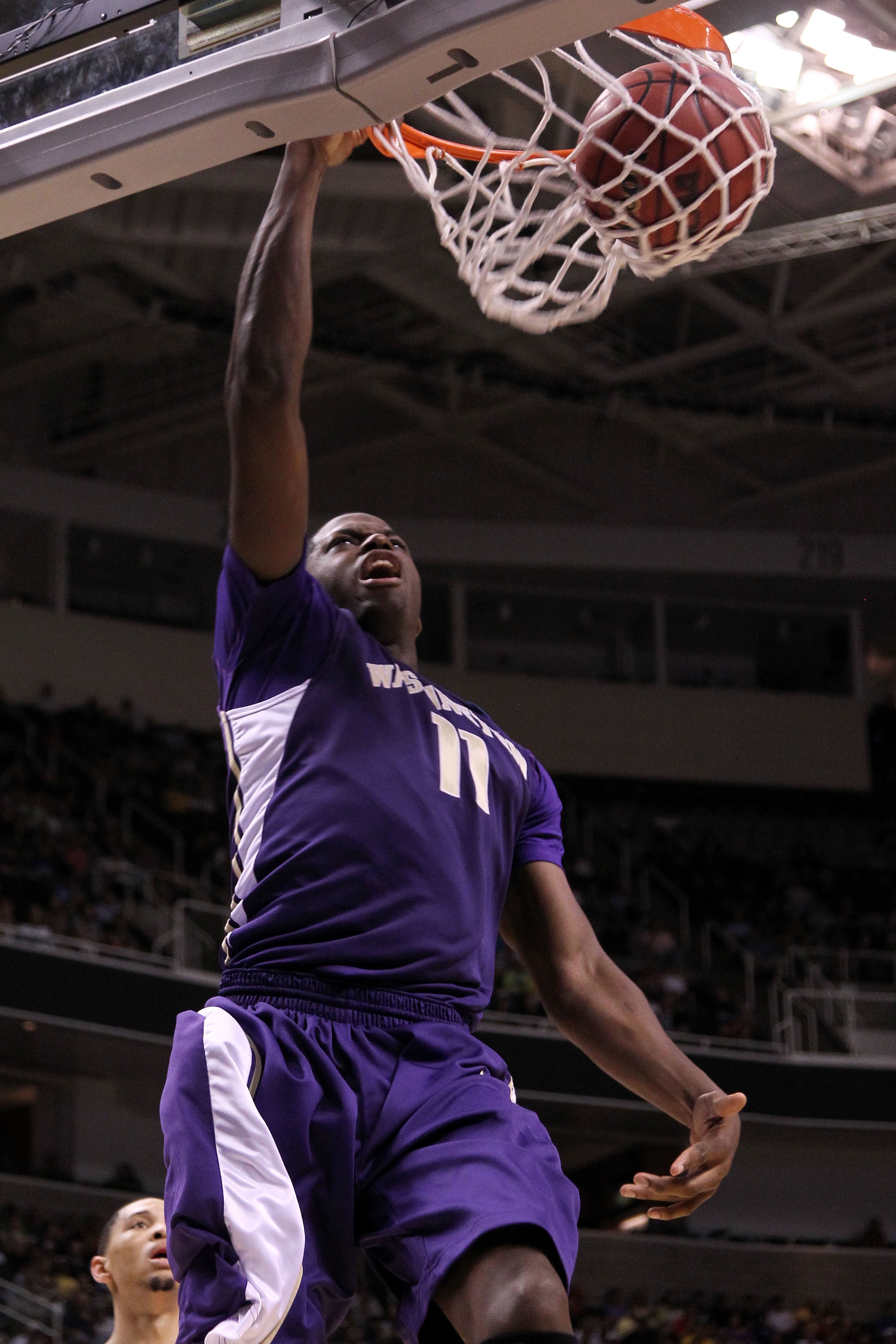 SAN JOSE, CA - MARCH 20:  Forward Matthew Bryan-Amaning #11 of the Washington Huskies dunks the ball against the New Mexico Lobos during the second round of the 2010 NCAA men's basketball tournament at HP Pavilion on March 20, 2010 in San Jose, California